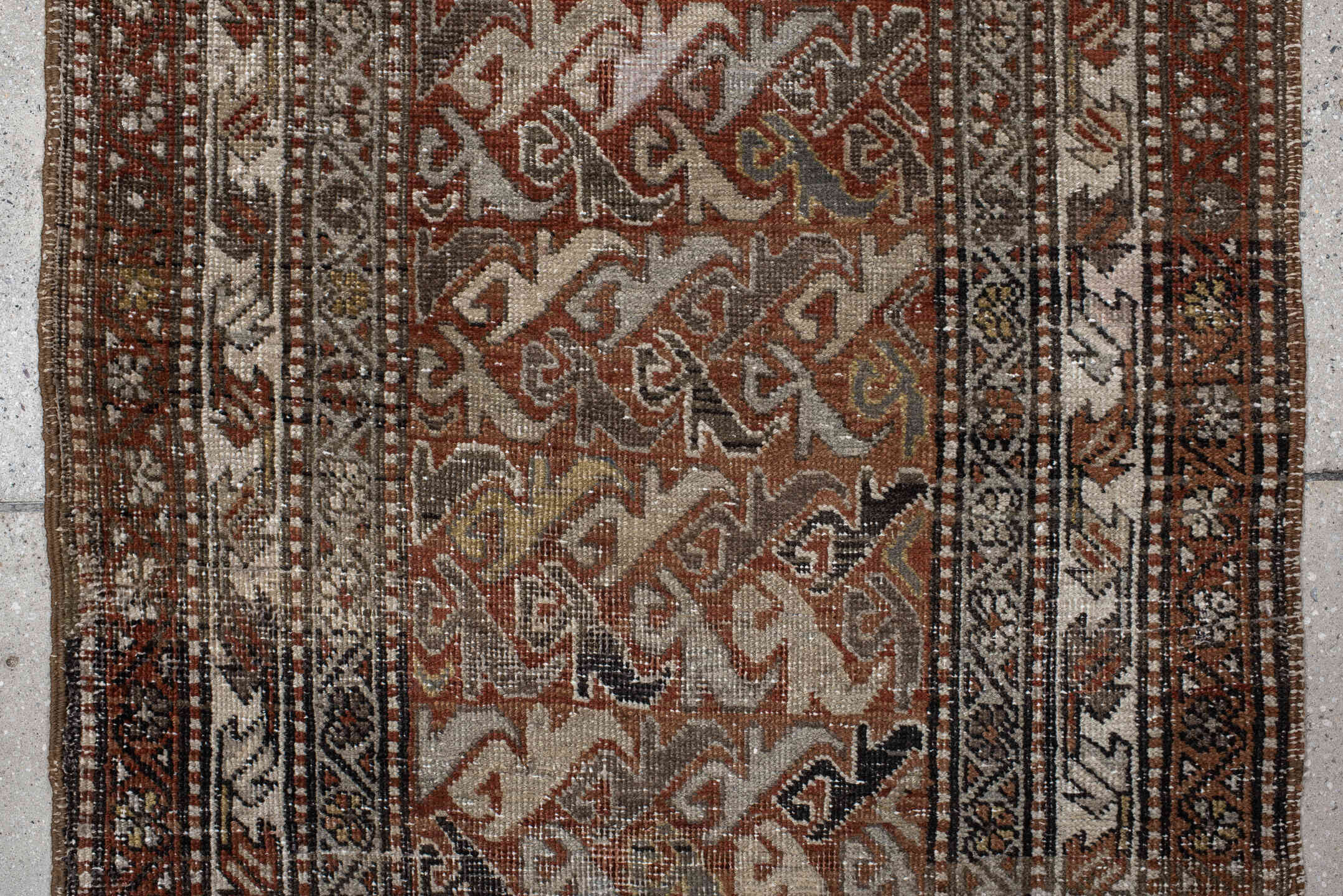2' x 12' one-of-a-kind handmade vintage Heriz runner rug. Color palette: rust, ivory, slate, taupe, camel, charcoal, sienna