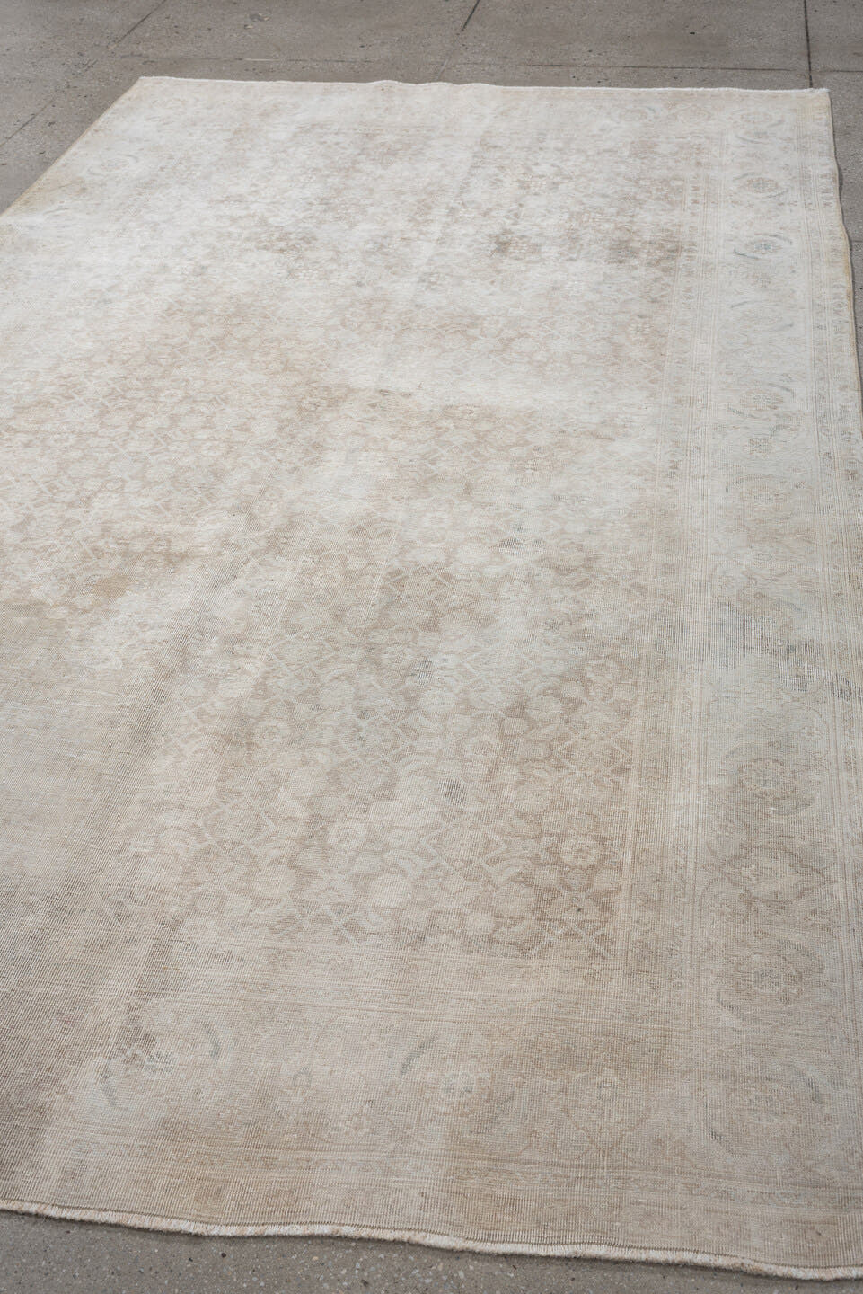 9' x 5' one-of-a-kind handmade vintage Tabriz rug. Color palette: ivory, taupe, beige, pale blue, cream, sand, light gray