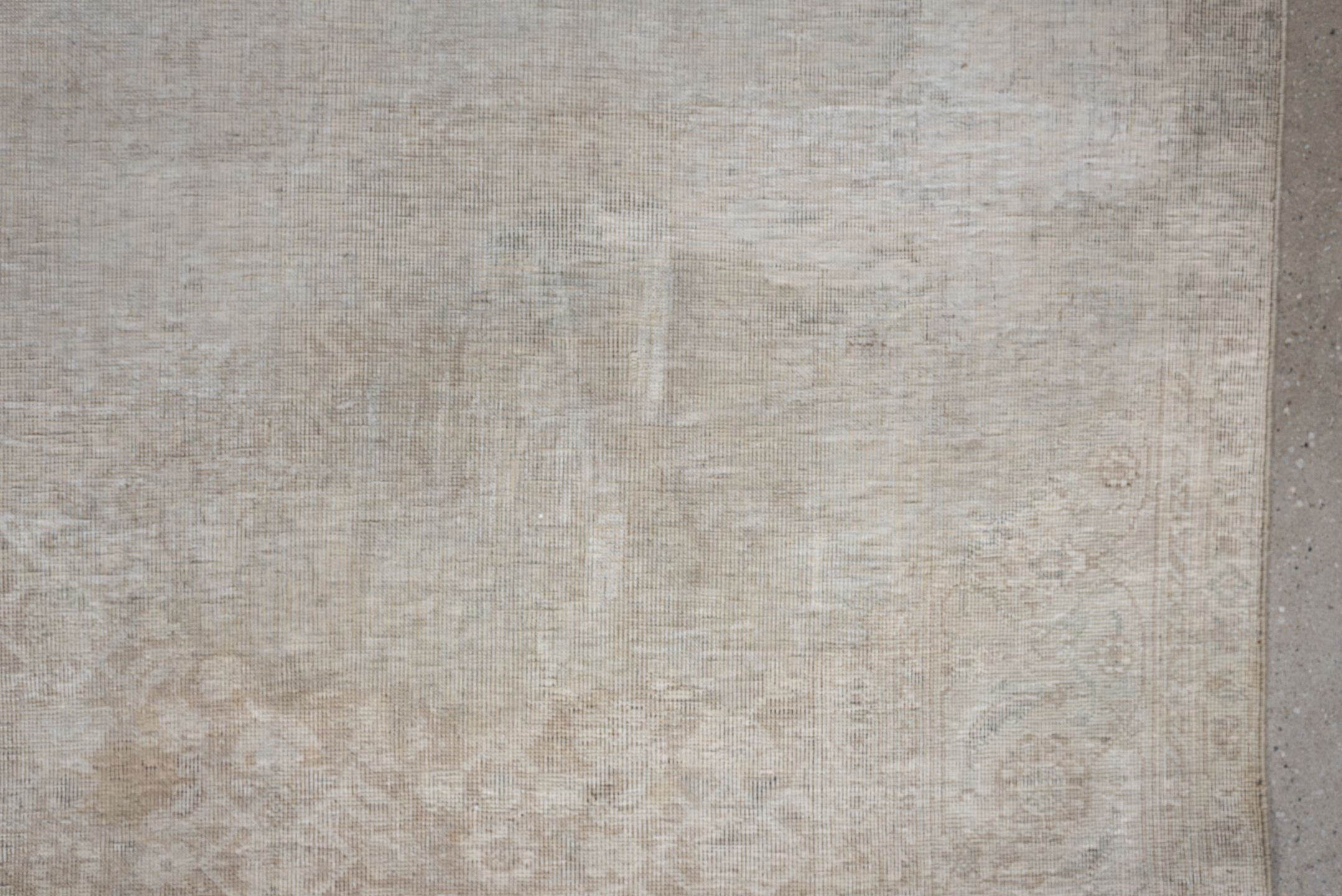 9' x 5' one-of-a-kind handmade vintage Tabriz rug. Color palette: ivory, taupe, beige, pale blue, cream, sand, light gray