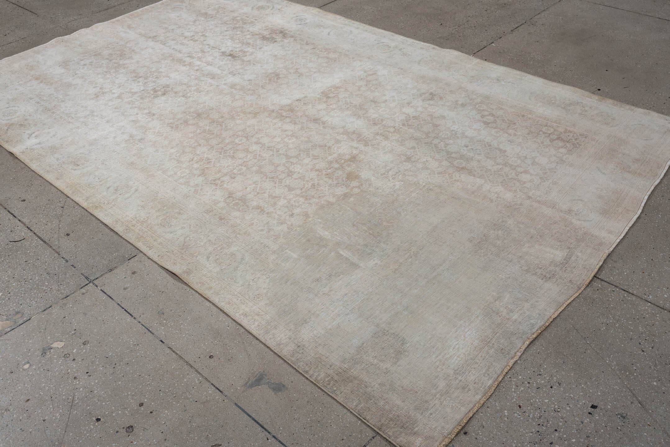9' x 5' one-of-a-kind handmade vintage Tabriz rug. Color palette: ivory, taupe, beige, pale blue, cream, sand, light gray