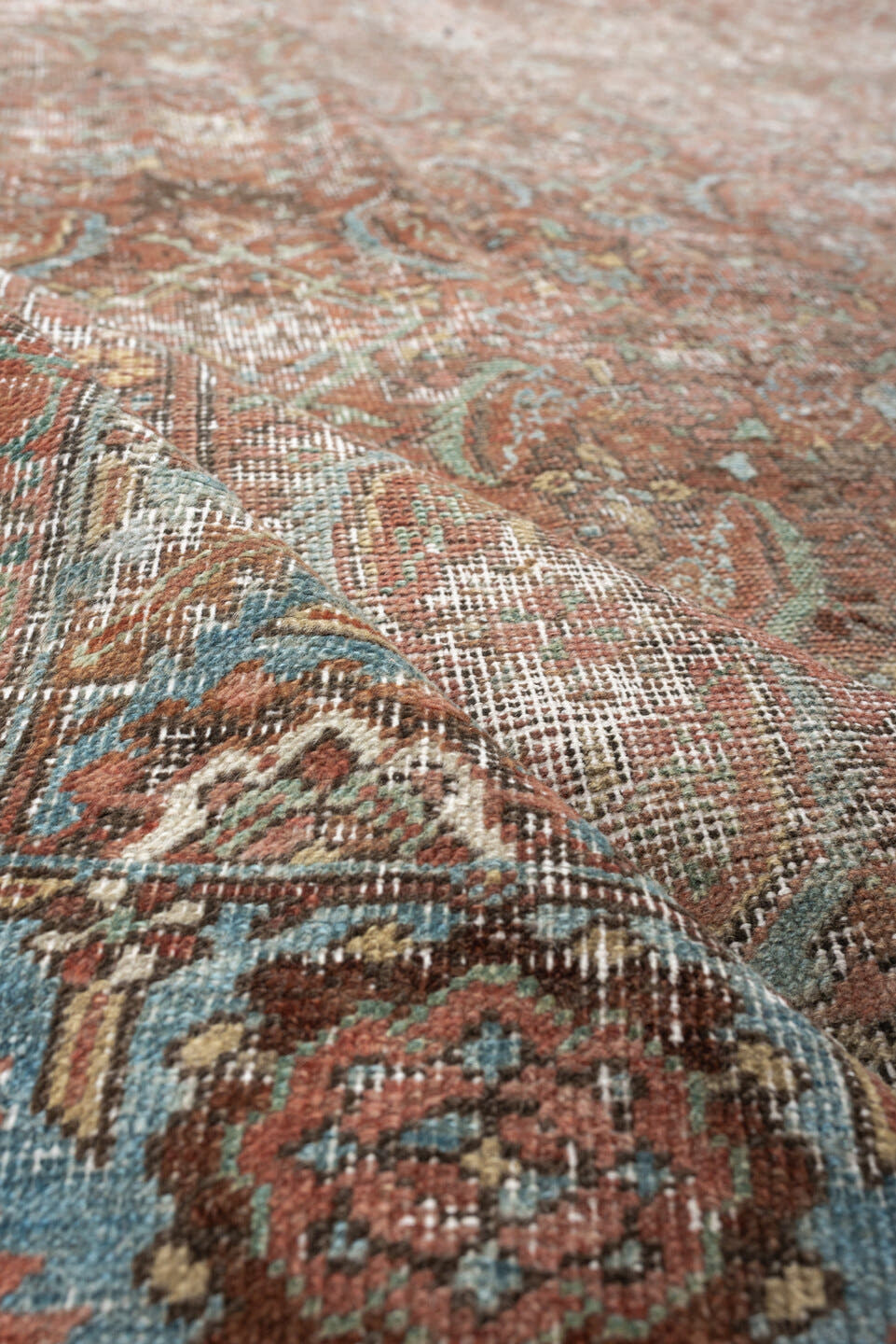 7' x 10' one-of-a-kind handmade vintage Bakhshayesh large size rug. Color palette: terracotta, sky blue, ivory, taupe, rust