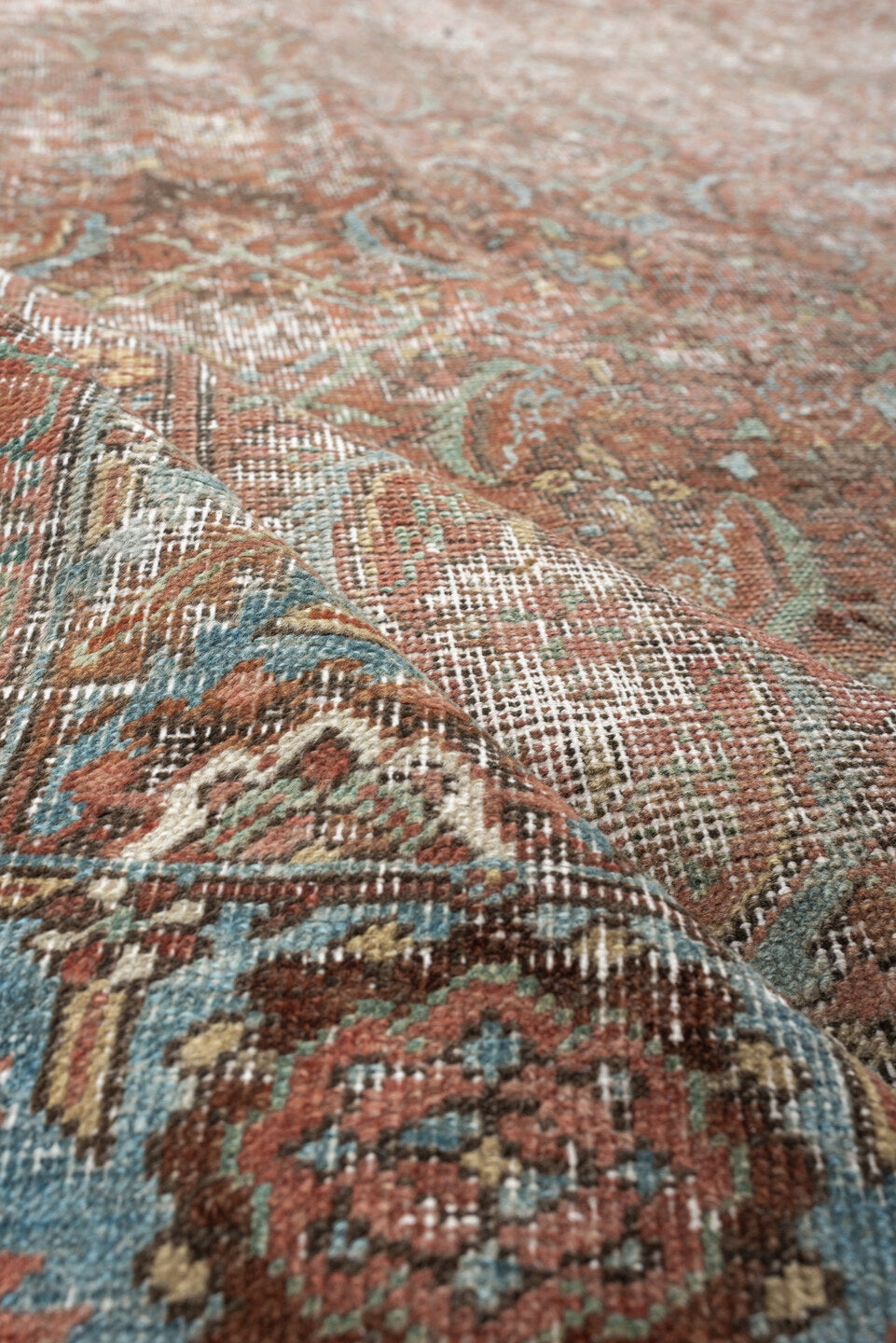7' x 10' one-of-a-kind handmade vintage Bakhshayesh large size rug. Color palette: terracotta, sky blue, ivory, taupe, rust