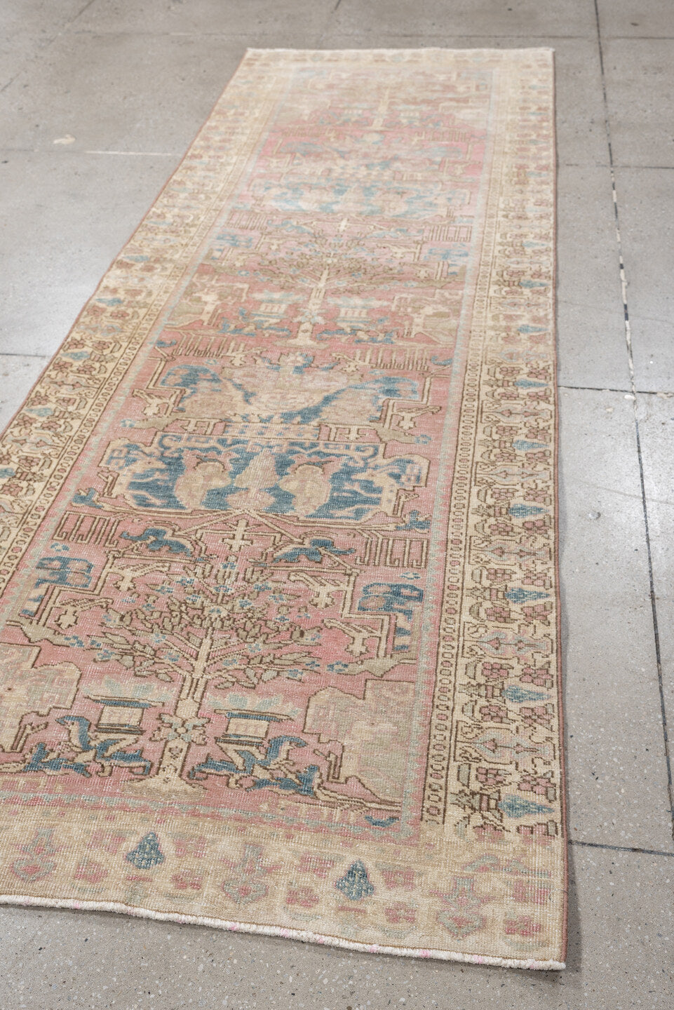 3' x 9' one-of-a-kind handmade vintage Saraband runner rug. Color palette: ivory, blush, muted blue, taupe, sage, rose