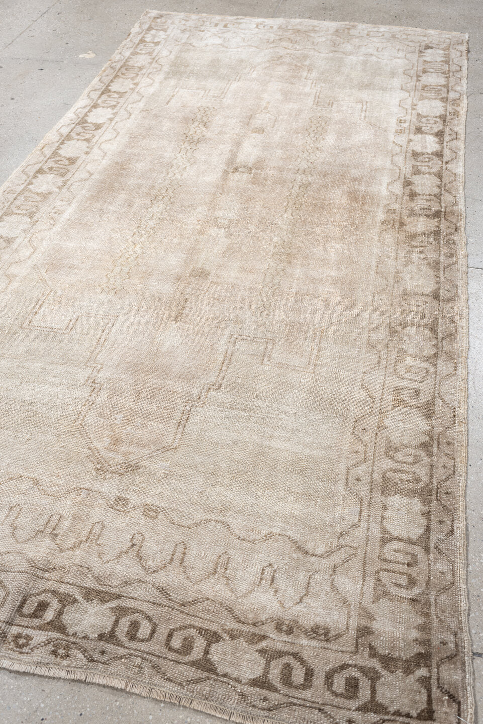 4' x 8' one-of-a-kind handmade vintage Anatolian runner rug. Color palette: ivory, taupe, beige, sand, light brown, gray