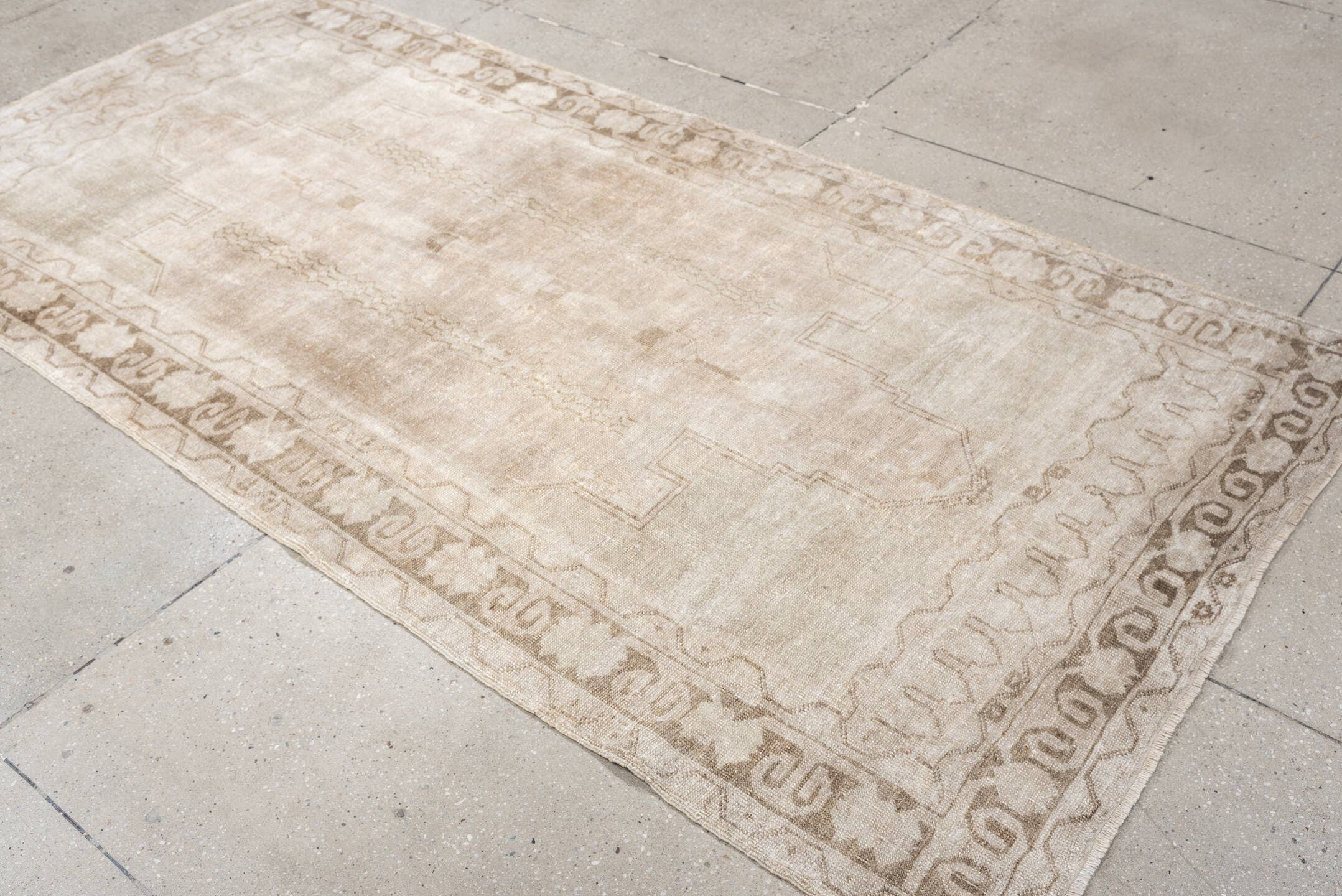 4' x 8' one-of-a-kind handmade vintage Anatolian runner rug. Color palette: ivory, taupe, beige, sand, light brown, gray