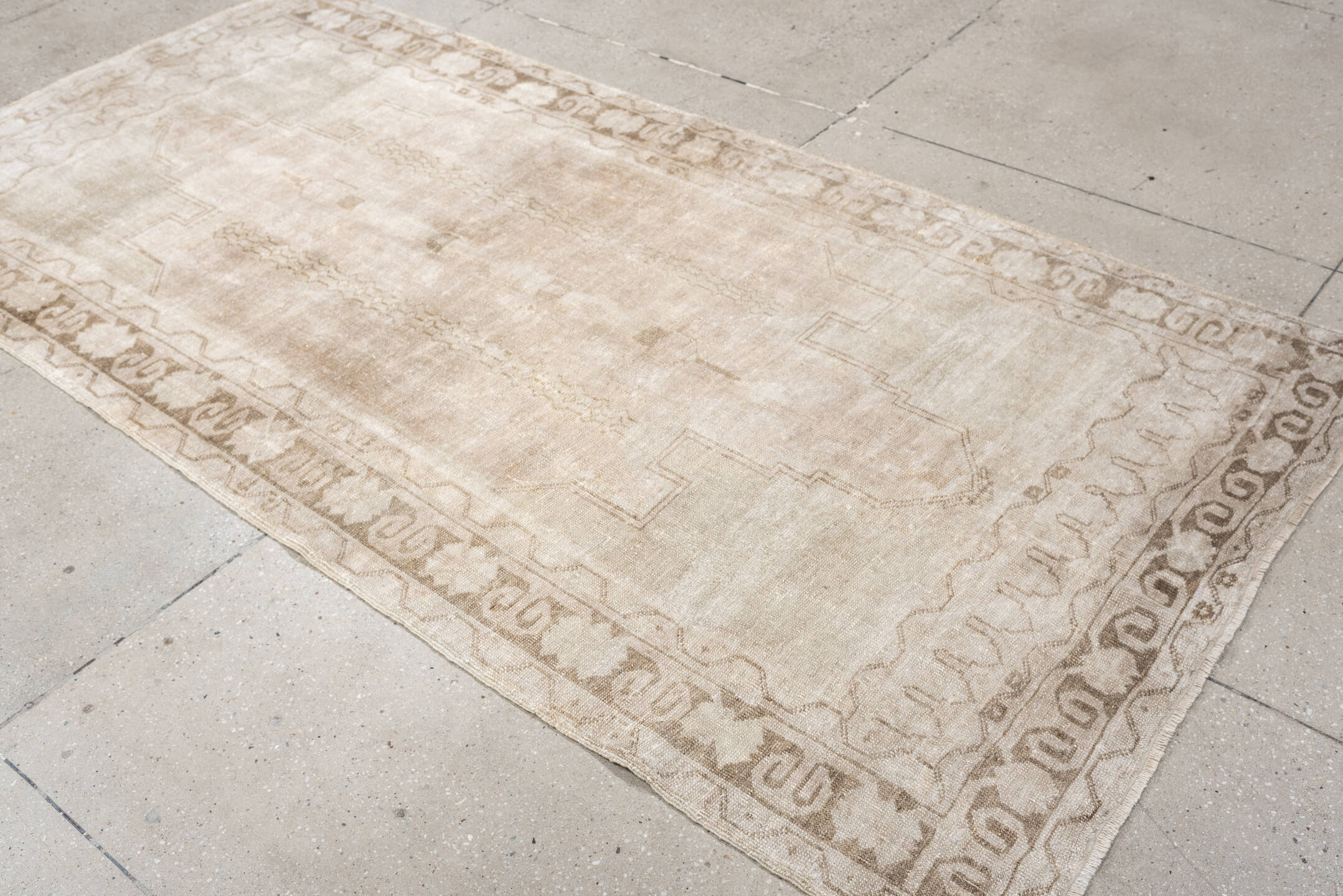 4' x 8' one-of-a-kind handmade vintage Anatolian runner rug. Color palette: ivory, taupe, beige, sand, light brown, gray