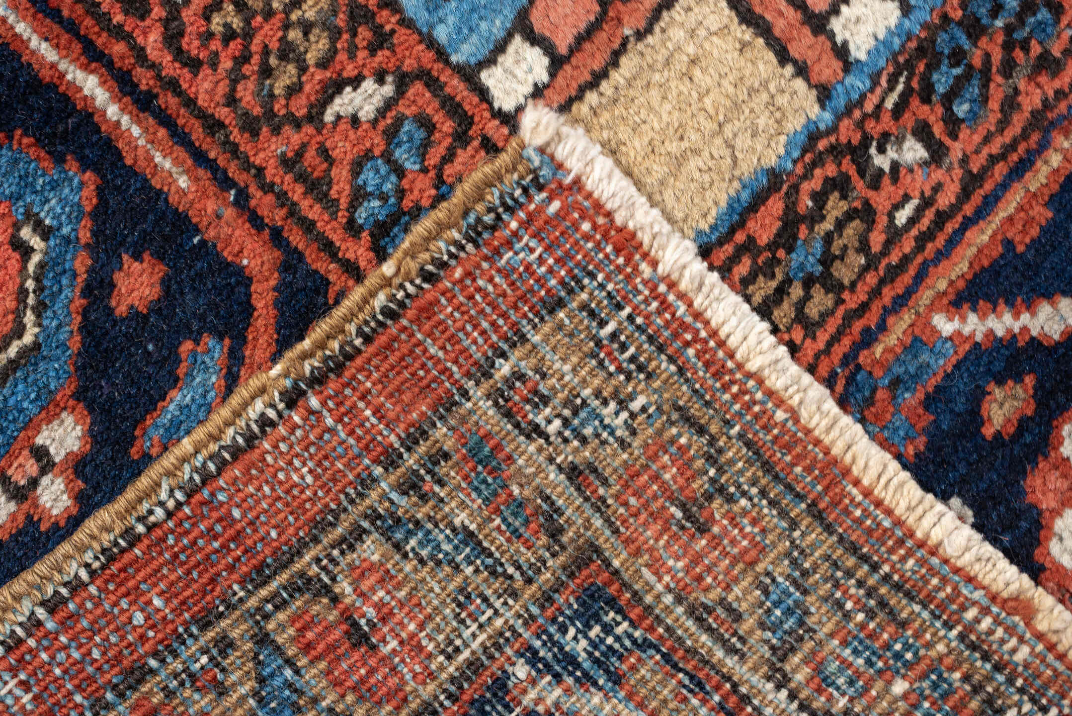 8' x 12' one-of-a-kind handmade vintage Heriz large size rug. Color palette: terracotta, navy, sky blue, ivory, camel, rust