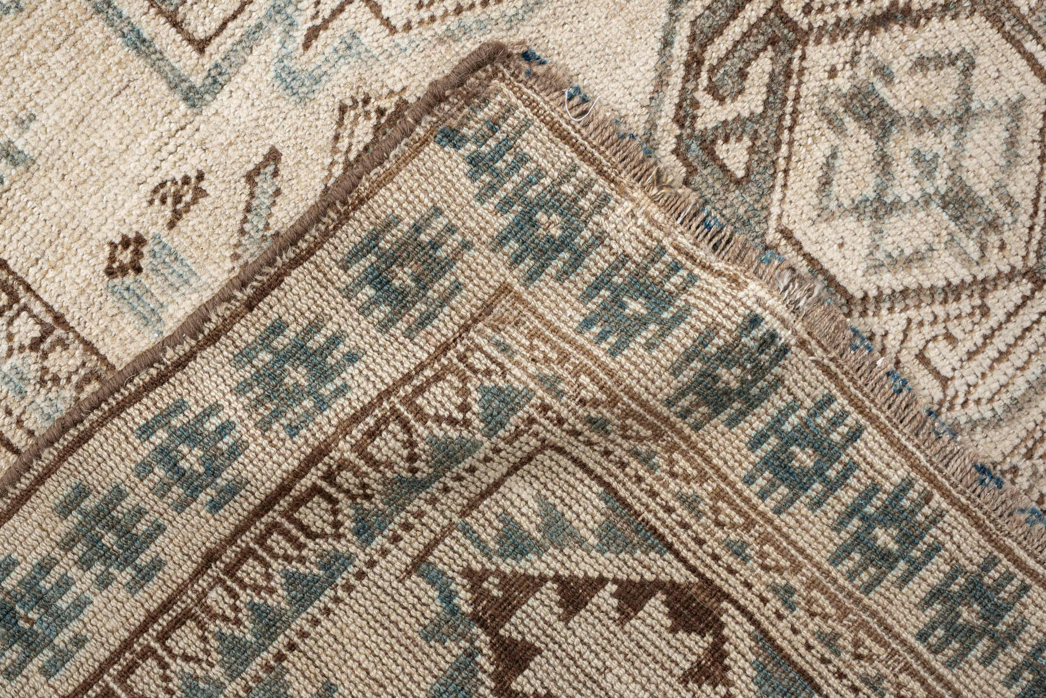 6' x 8' one-of-a-kind handmade vintage Belouch medium size rug. Color palette: ivory, taupe, brown, camel, pale blue, beige