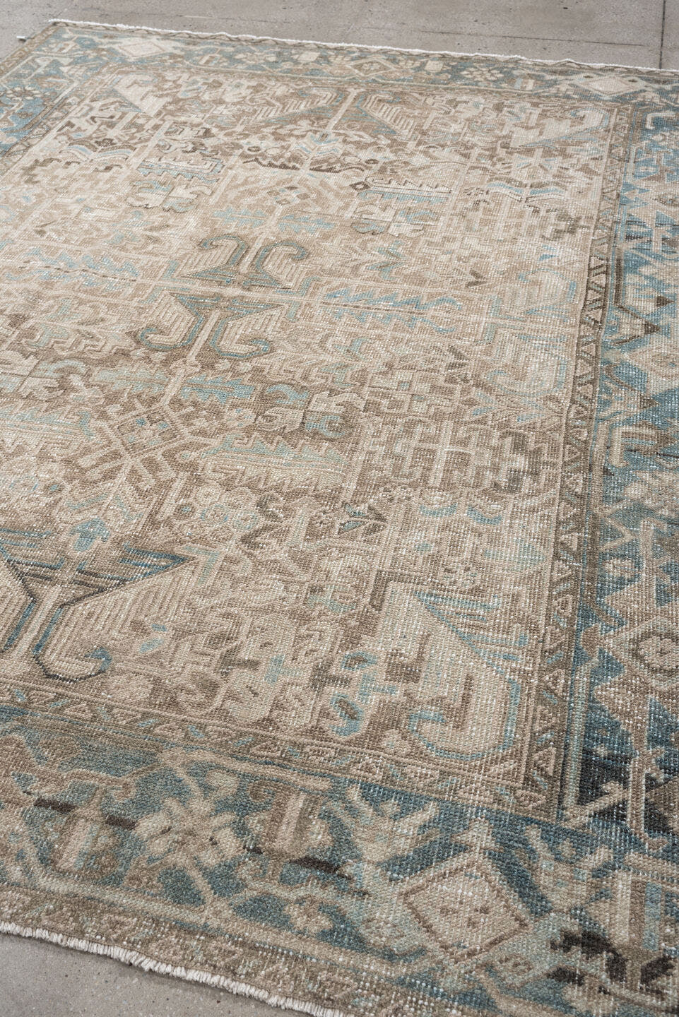 7' x 8' one-of-a-kind handmade vintage Heriz rug. Color palette: ivory, sky blue, taupe, charcoal, beige, brown, light blue