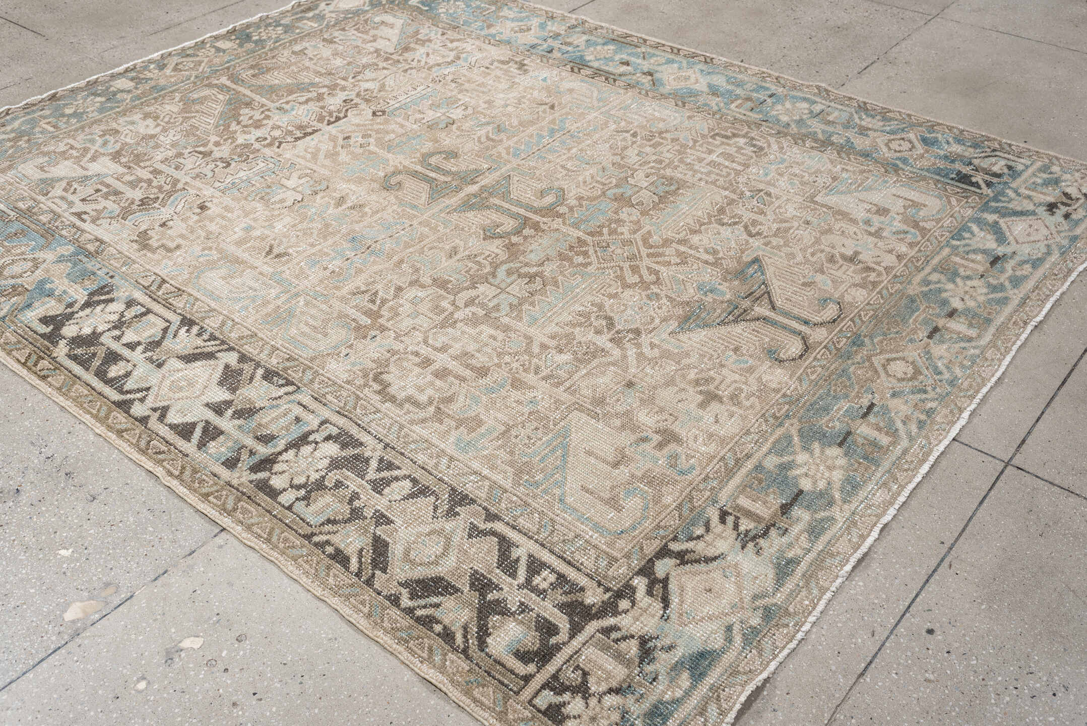 7' x 8' one-of-a-kind handmade vintage Heriz rug. Color palette: ivory, sky blue, taupe, charcoal, beige, brown, light blue