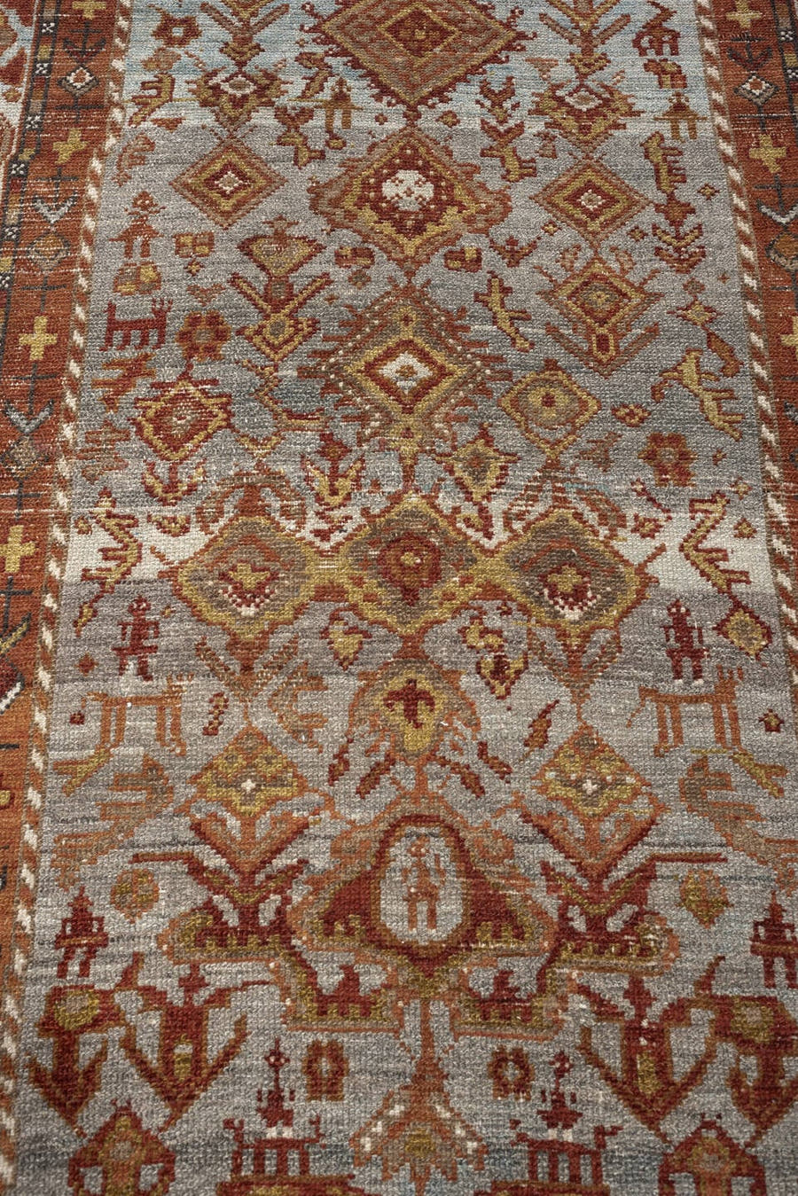 3' x 11' one-of-a-kind handmade antique Malayer runner rug. Color palette: ivory, rust, blue gray, terracotta, camel, brown