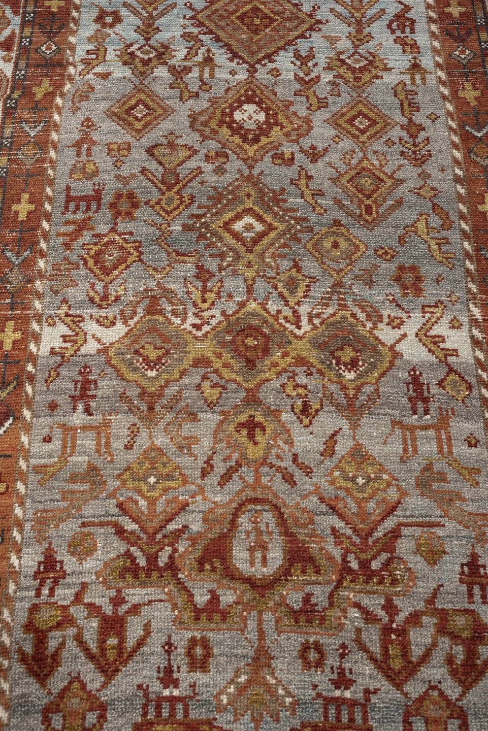 3' x 11' one-of-a-kind handmade antique Malayer runner rug. Color palette: ivory, rust, blue gray, terracotta, camel, brown