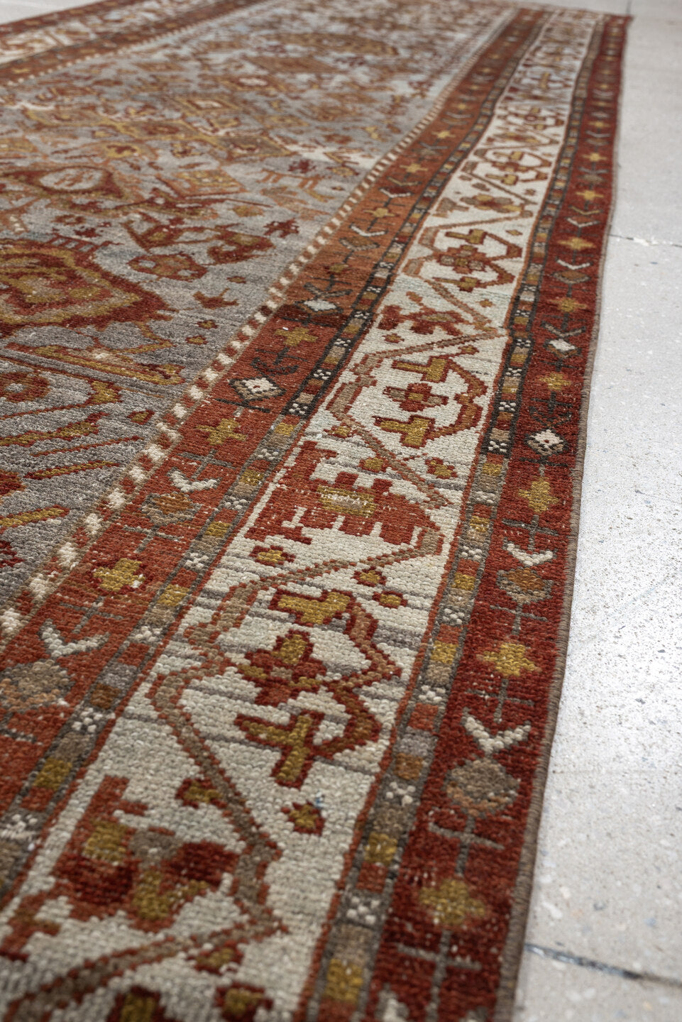 3' x 11' one-of-a-kind handmade antique Malayer runner rug. Color palette: ivory, rust, blue gray, terracotta, camel, brown