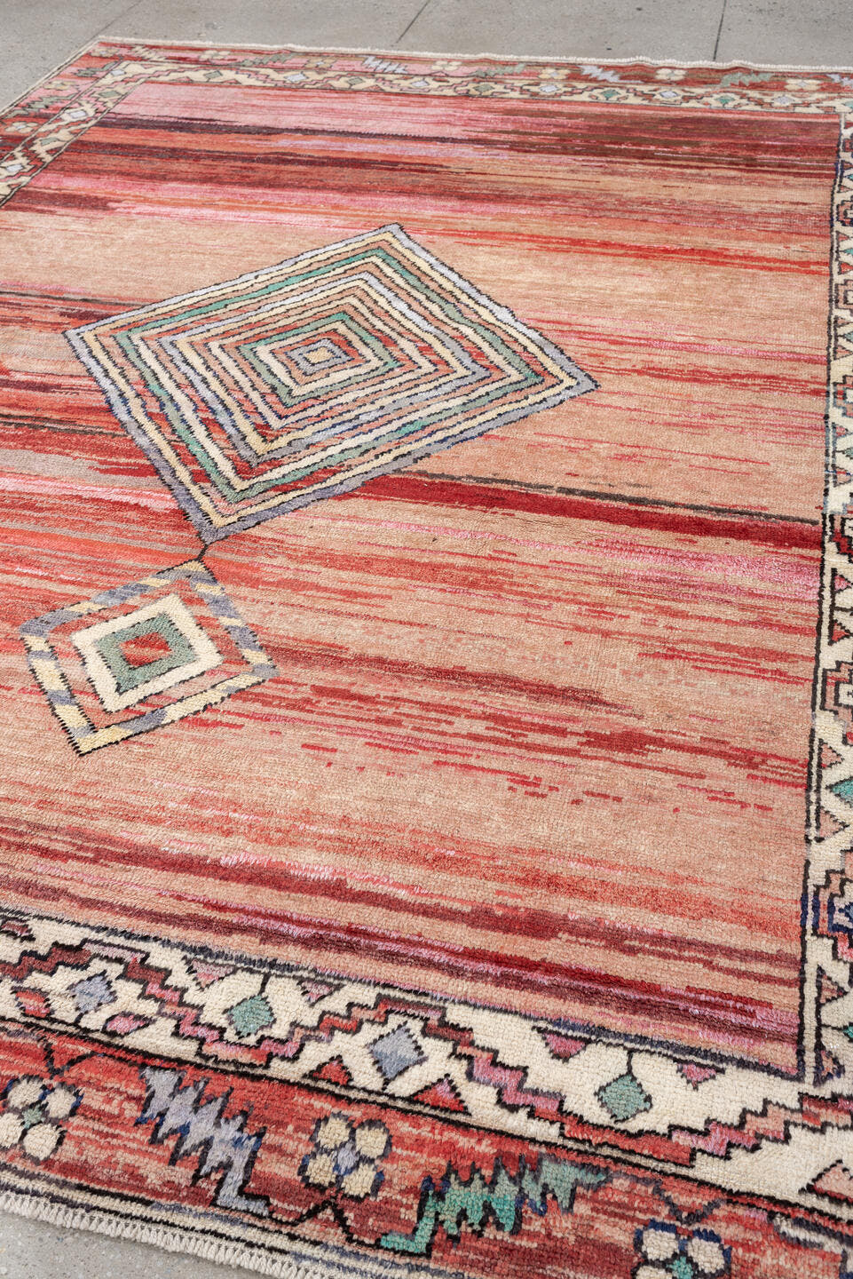 8' x 10' one-of-a-kind handmade vintage Kars large size rug. Color palette: coral, ivory, crimson, sage, slate, charcoal