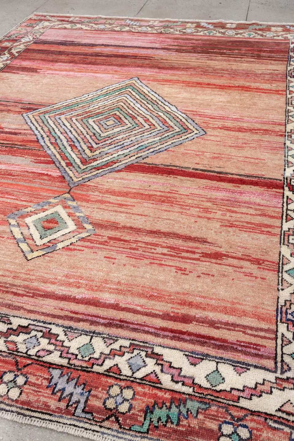 8' x 10' one-of-a-kind handmade vintage Kars large size rug. Color palette: coral, ivory, crimson, sage, slate, charcoal