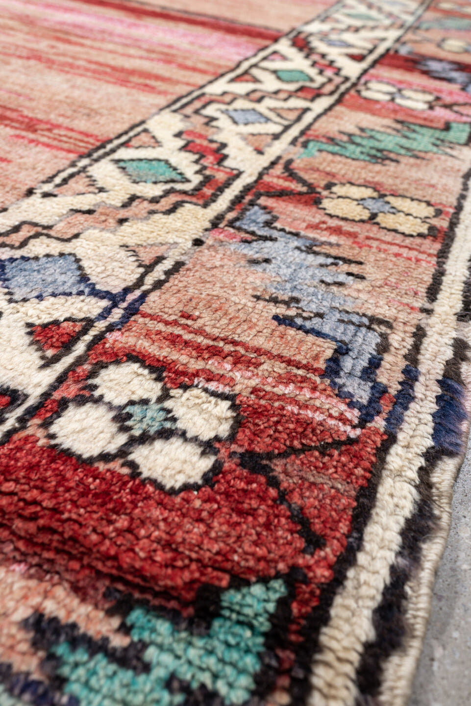8' x 10' one-of-a-kind handmade vintage Kars large size rug. Color palette: coral, ivory, crimson, sage, slate, charcoal