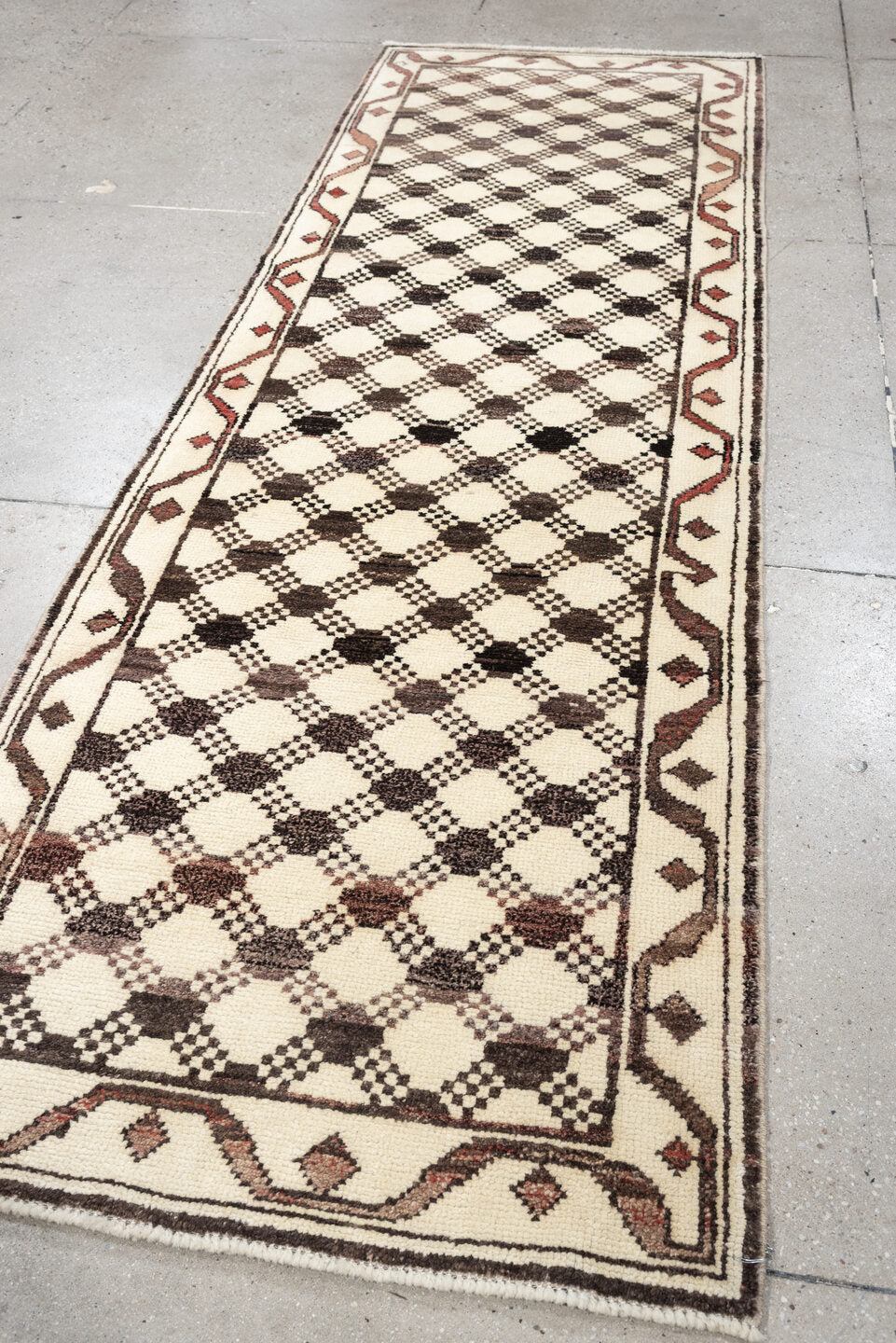 3' x 9' one-of-a-kind handmade vintage Kars runner rug. Color palette: ivory, brown, taupe, muted rose, charcoal, terracotta