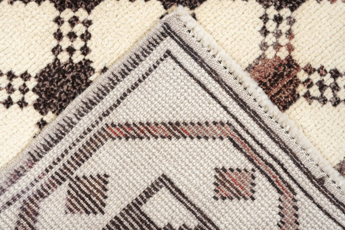 3' x 9' one-of-a-kind handmade vintage Kars runner rug. Color palette: ivory, brown, taupe, muted rose, charcoal, terracotta