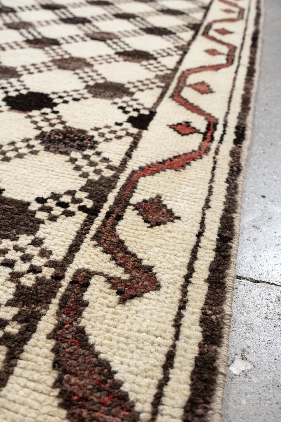 3' x 9' one-of-a-kind handmade vintage Kars runner rug. Color palette: ivory, brown, taupe, muted rose, charcoal, terracotta