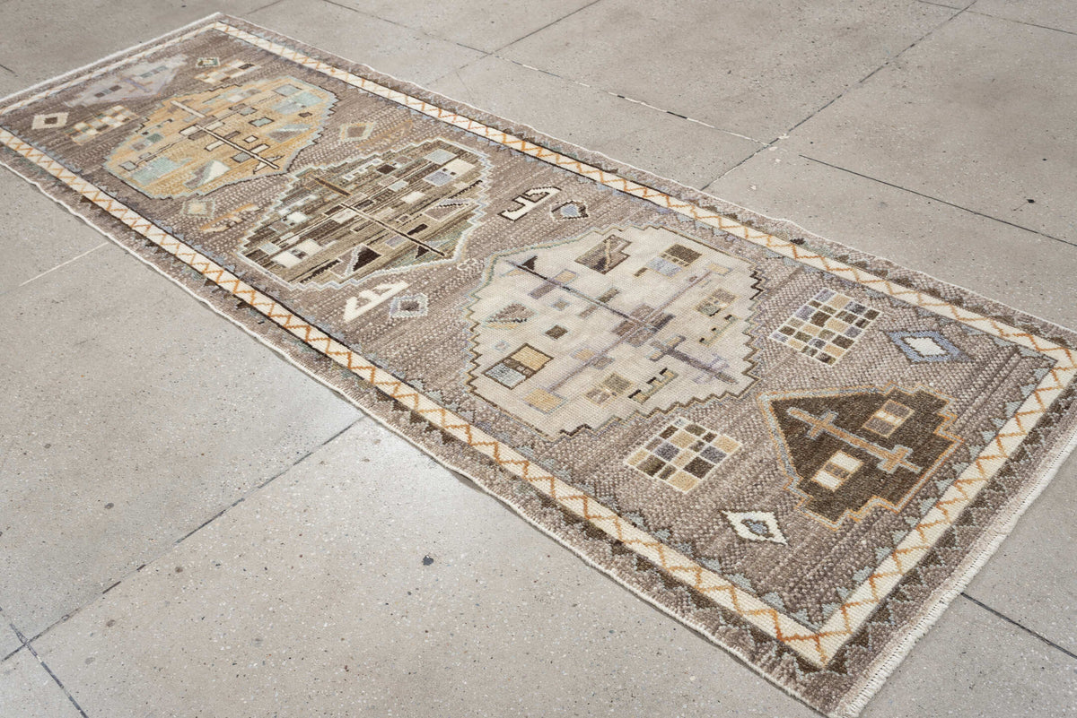 3' x 9' one-of-a-kind handmade vintage Kars runner rug. Color palette: taupe, ivory, charcoal, terracotta, blue gray, camel