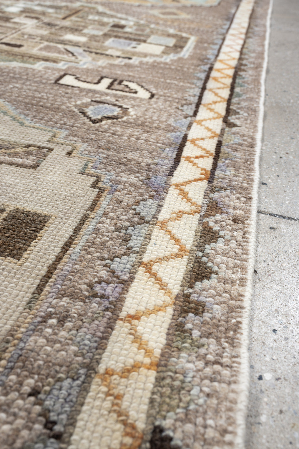 3' x 9' one-of-a-kind handmade vintage Kars runner rug. Color palette: taupe, ivory, charcoal, terracotta, blue gray, camel