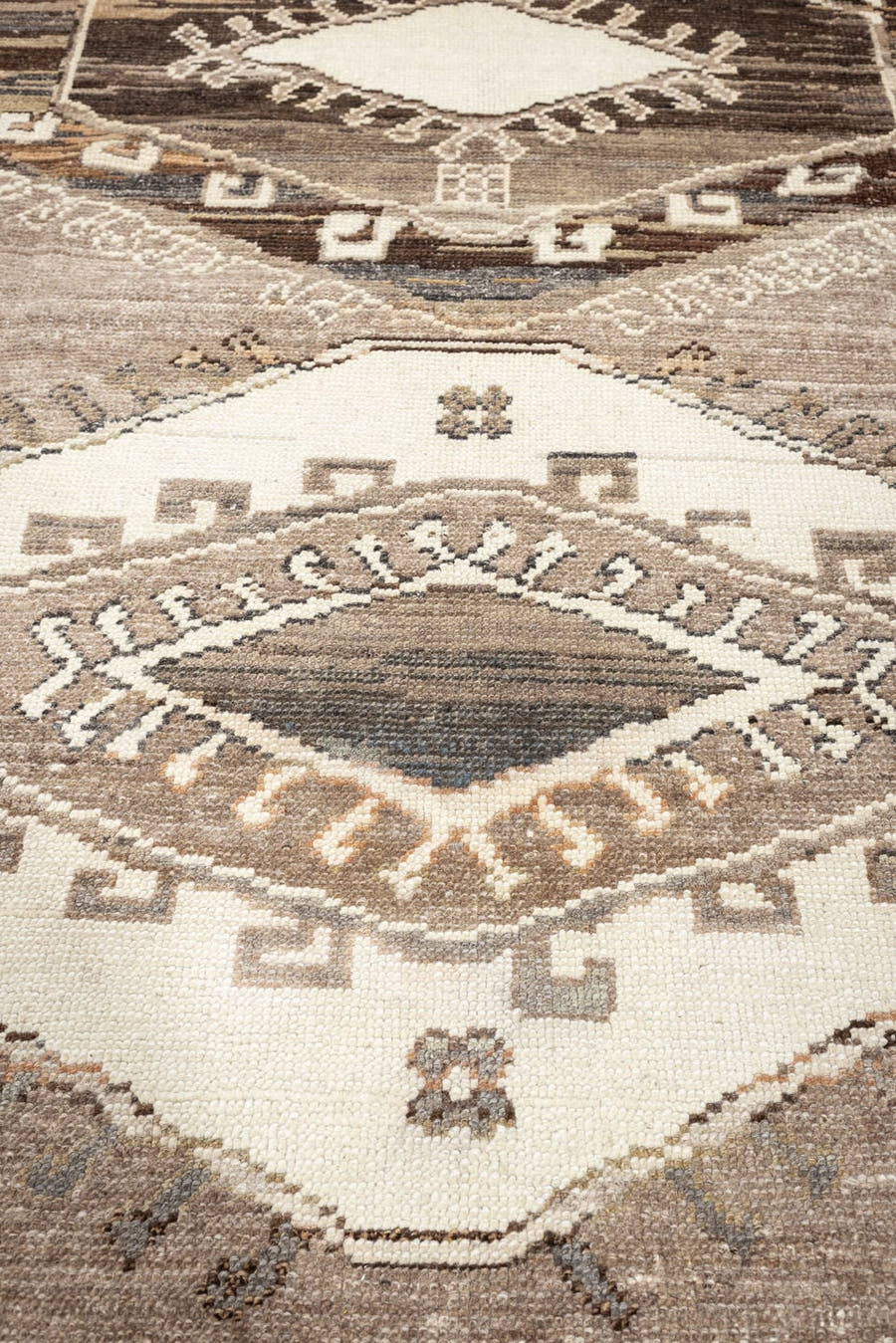 7' x 10' one-of-a-kind handmade vintage Kars large size rug. Color palette: taupe, ivory, brown, charcoal, camel, beige