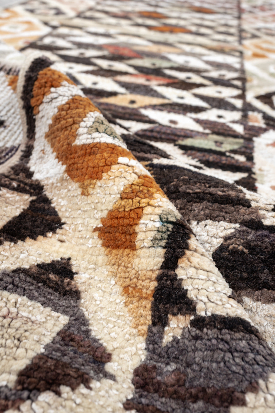 3' x 9' one-of-a-kind handmade vintage Kars runner rug. Color palette: dark brown, ivory, sage, rust, coral, taupe, charcoal