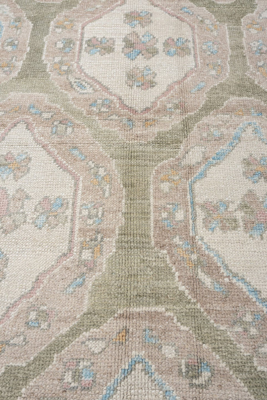9' x 14' one-of-a-kind handmade vintage Oushak rug. Color palette: sage, ivory, blush, taupe, powder blue, cream, pewter