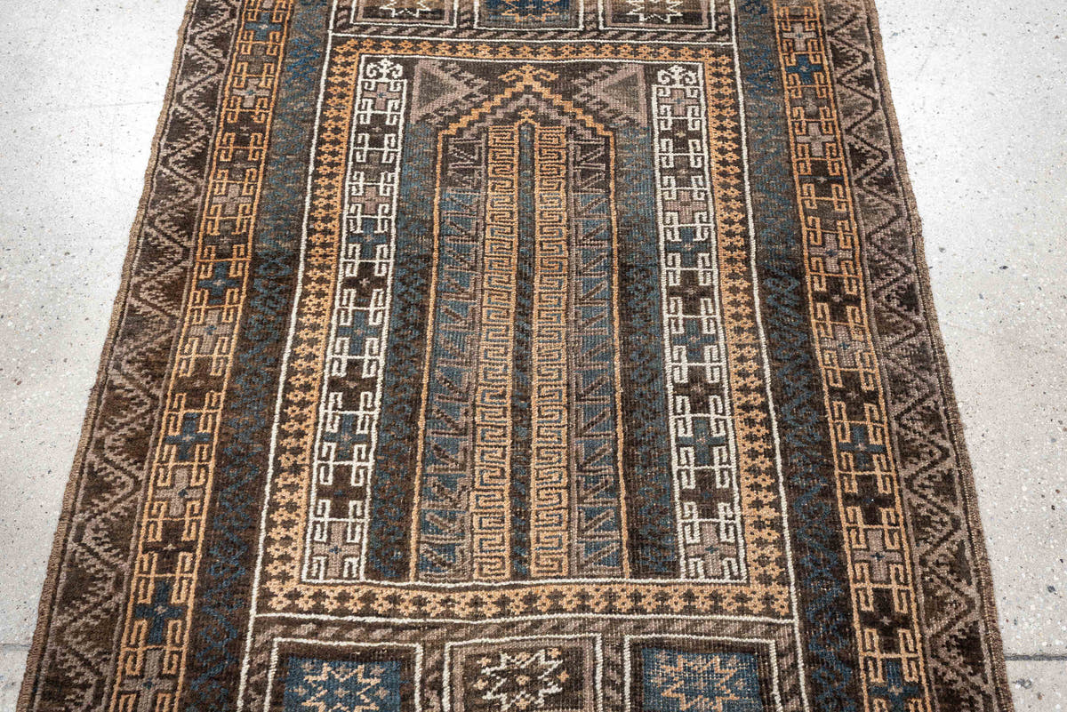 3' x 4' one-of-a-kind handmade antique Belouch small size rug. Color palette: brown, ivory, teal, peach, charcoal, taupe