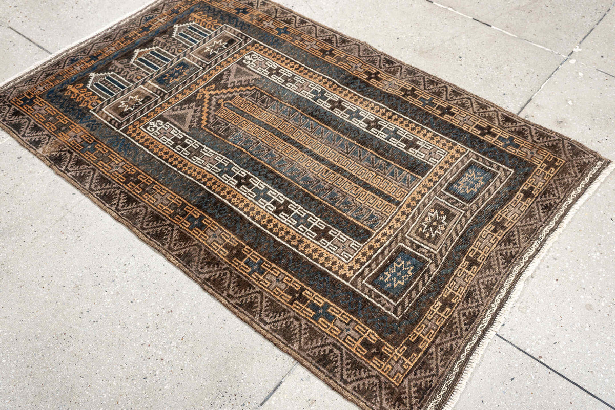 3' x 4' one-of-a-kind handmade antique Belouch small size rug. Color palette: brown, ivory, teal, peach, charcoal, taupe