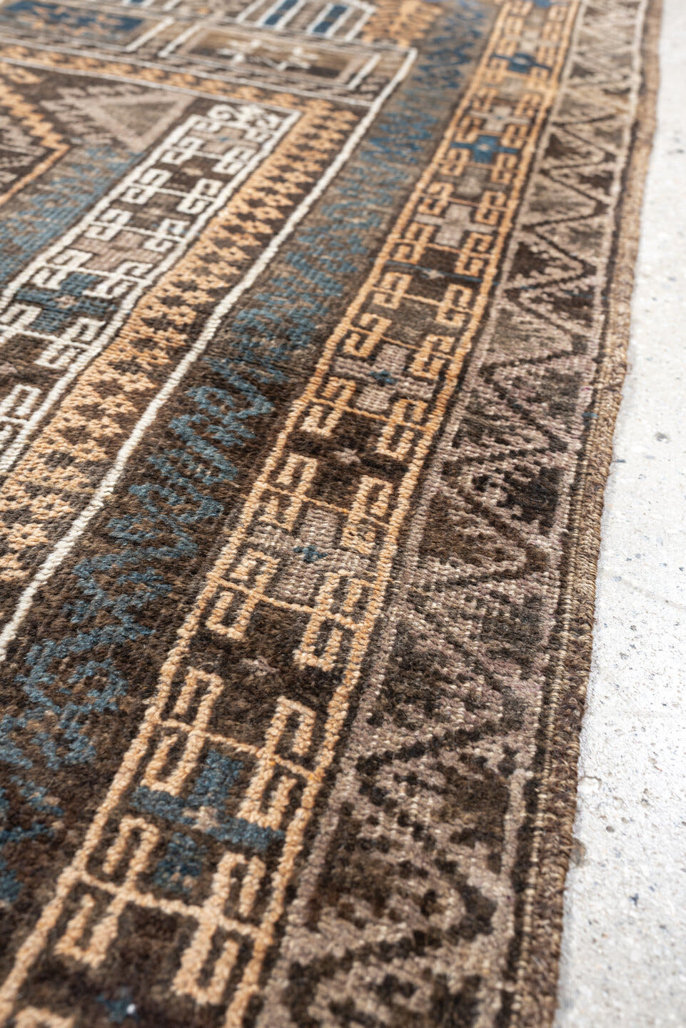 3' x 4' one-of-a-kind handmade antique Belouch small size rug. Color palette: brown, ivory, teal, peach, charcoal, taupe