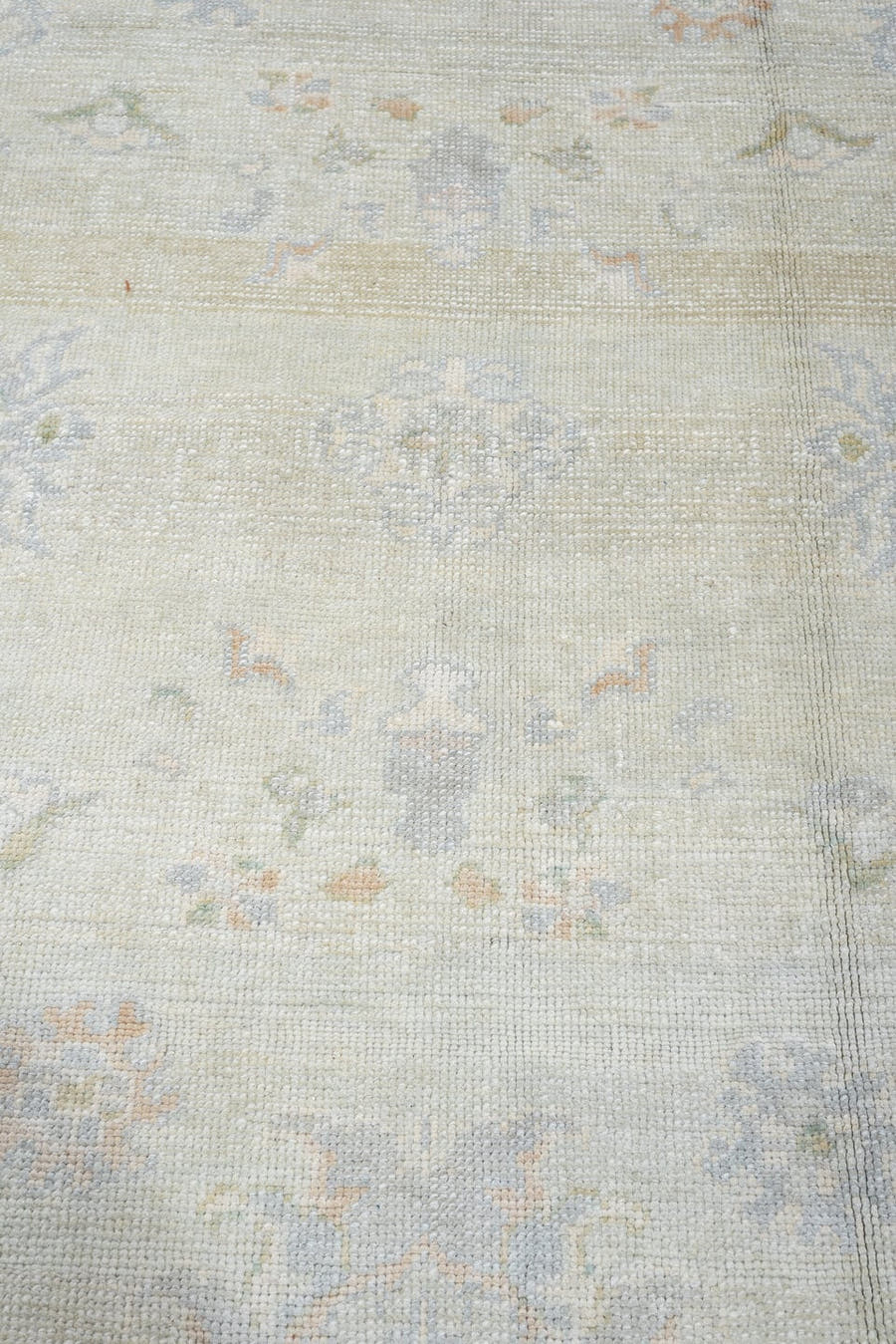 9' x 12' one-of-a-kind handmade vintage Oushak large size rug. Color palette: ivory, powder blue, pale sage, peach