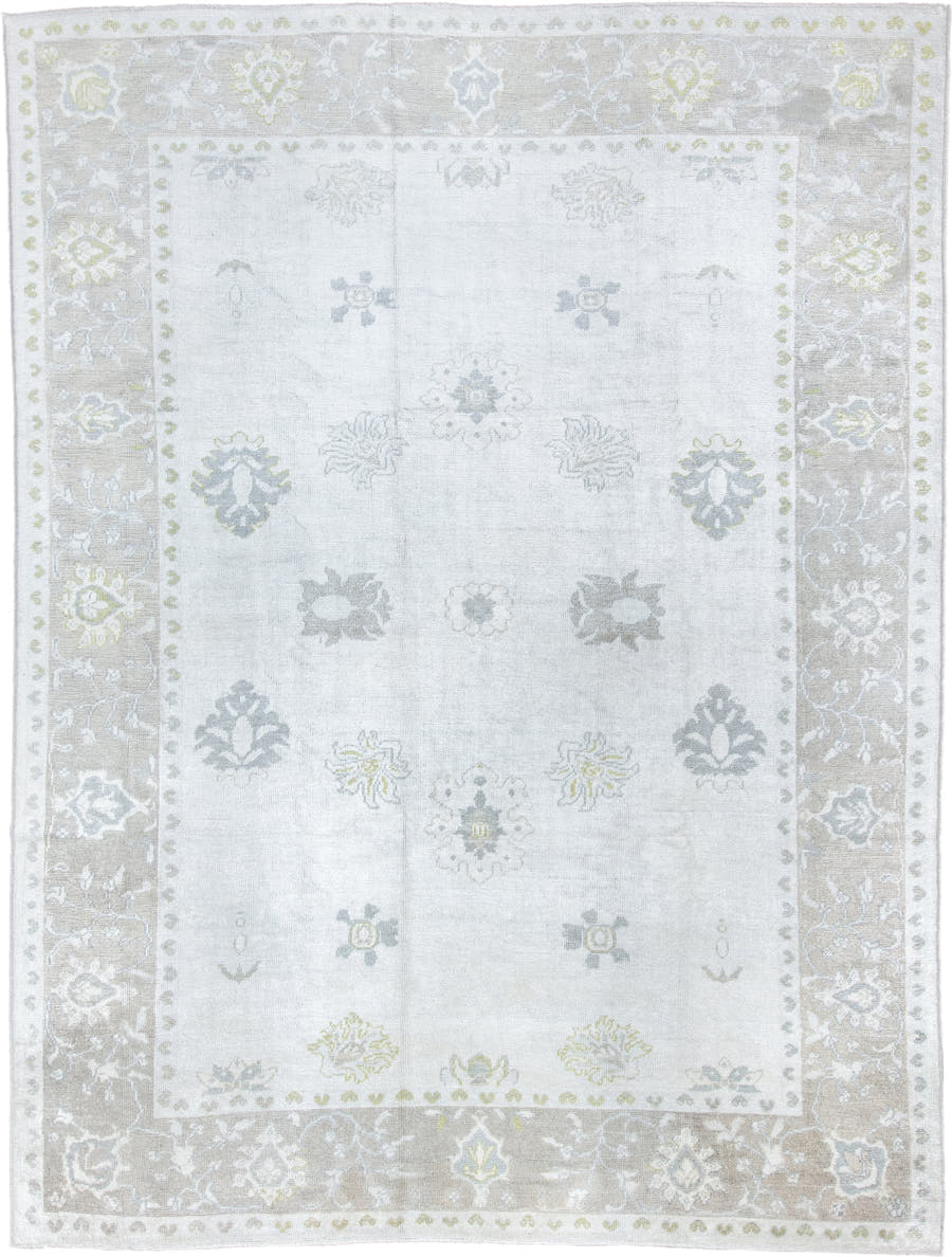 9' x 12' one-of-a-kind handmade vintage Oushak large size rug. Color palette: ivory, taupe, pale blue, sage, soft gray