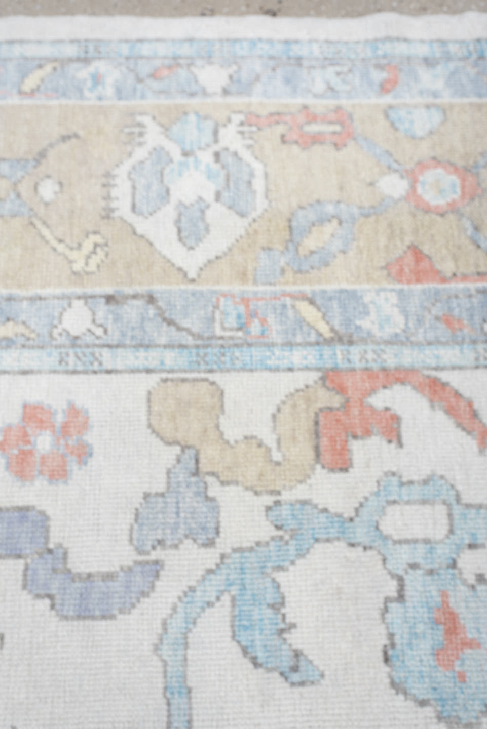 9' x 12' one-of-a-kind handmade vintage Oushak large size rug. Color palette: ivory, powder blue, taupe, coral, pale blue