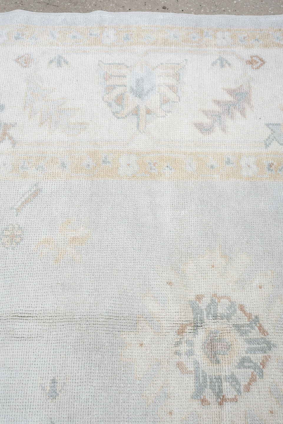 10' x 12' one-of-a-kind handmade vintage Oushak oversize rug. Color palette: blue gray, ivory, sage, dusty rose, terracotta