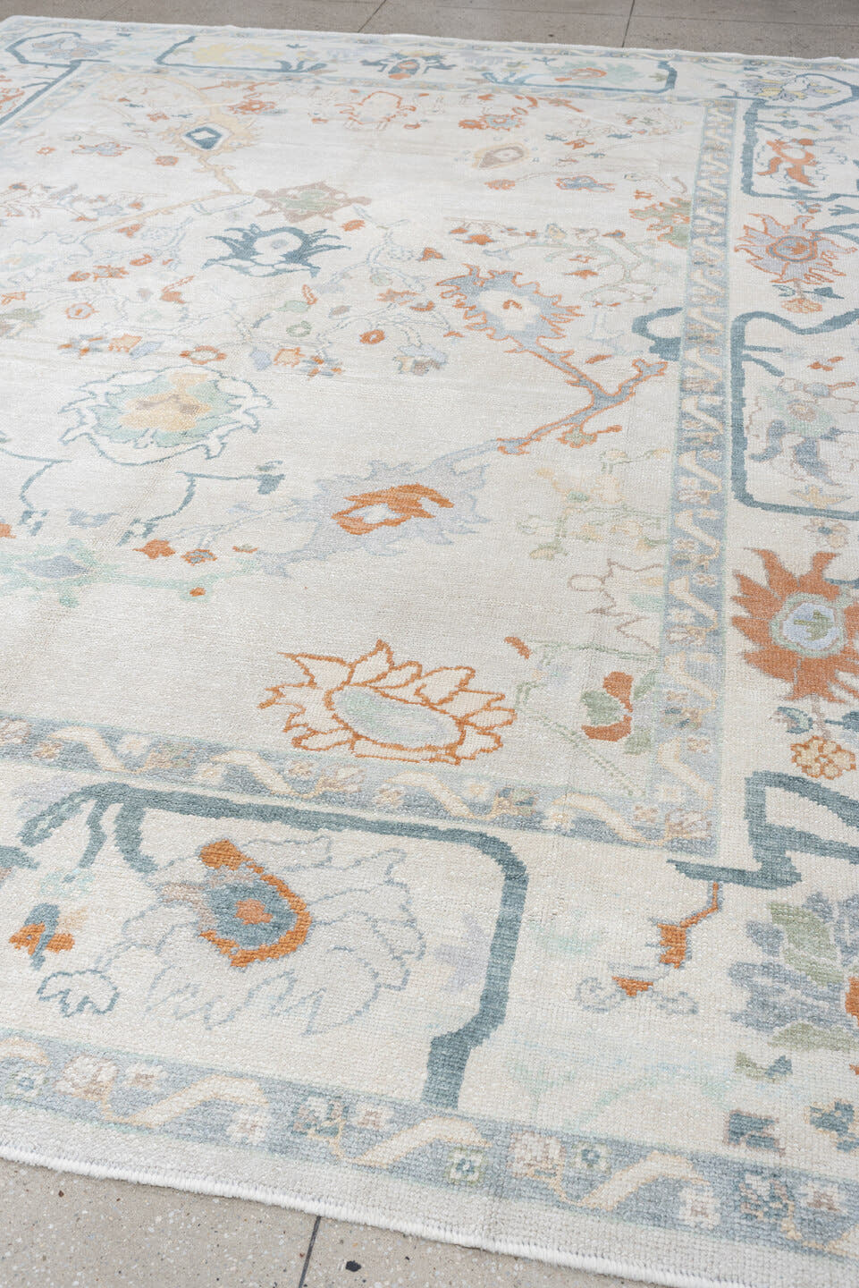 10' x 13' one-of-a-kind handmade vintage Oushak large size rug. Color palette: ivory, powder blue, sage, coral, peach, taupe