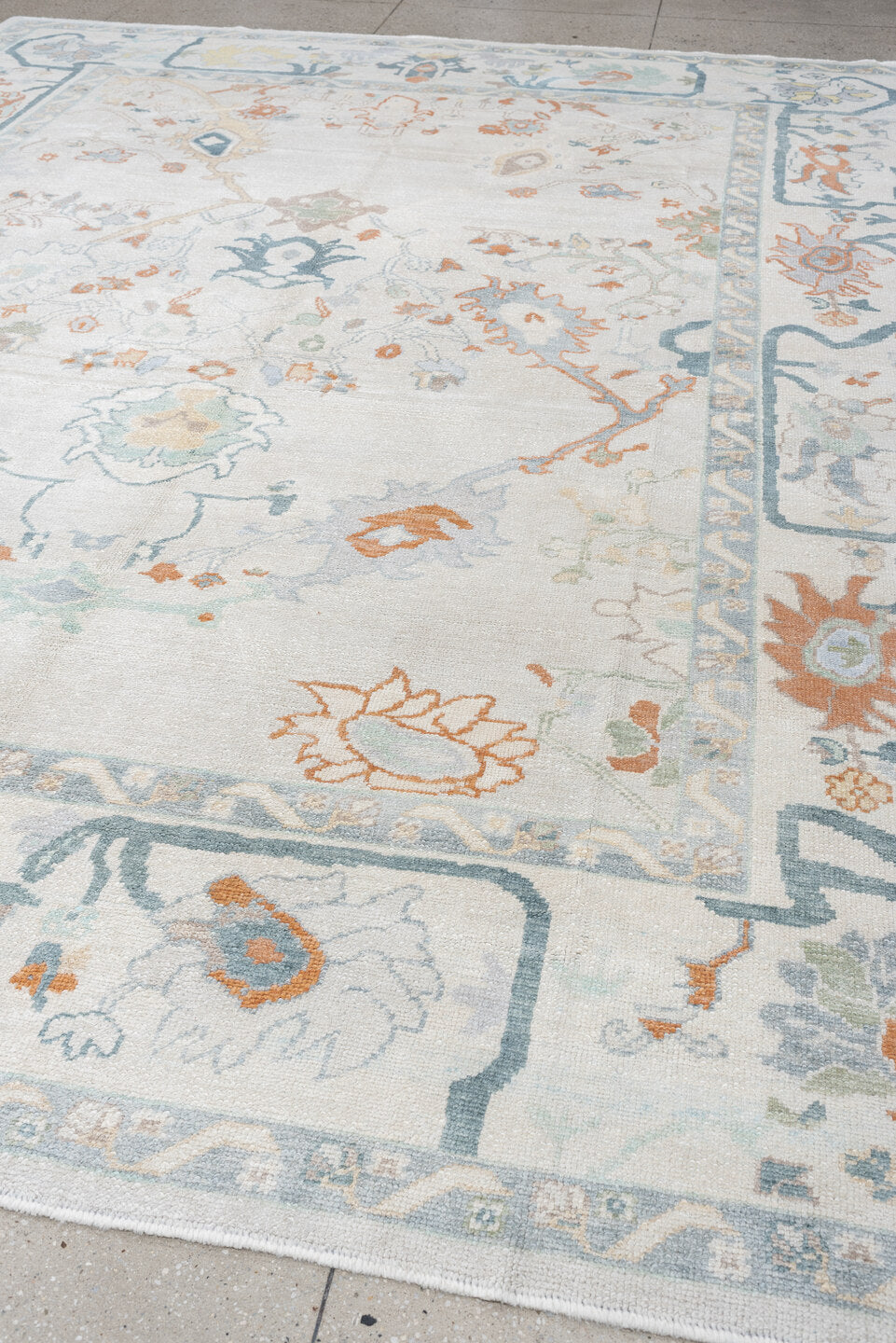 10' x 13' one-of-a-kind handmade vintage Oushak large size rug. Color palette: ivory, powder blue, sage, coral, peach, taupe