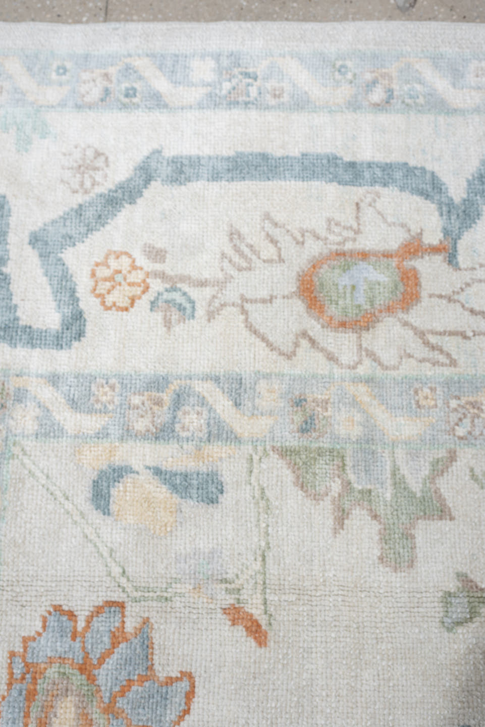 10' x 13' one-of-a-kind handmade vintage Oushak large size rug. Color palette: ivory, powder blue, sage, coral, peach, taupe