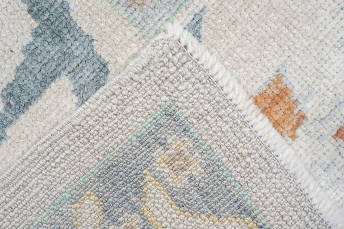 10' x 13' one-of-a-kind handmade vintage Oushak large size rug. Color palette: ivory, powder blue, sage, coral, peach, taupe
