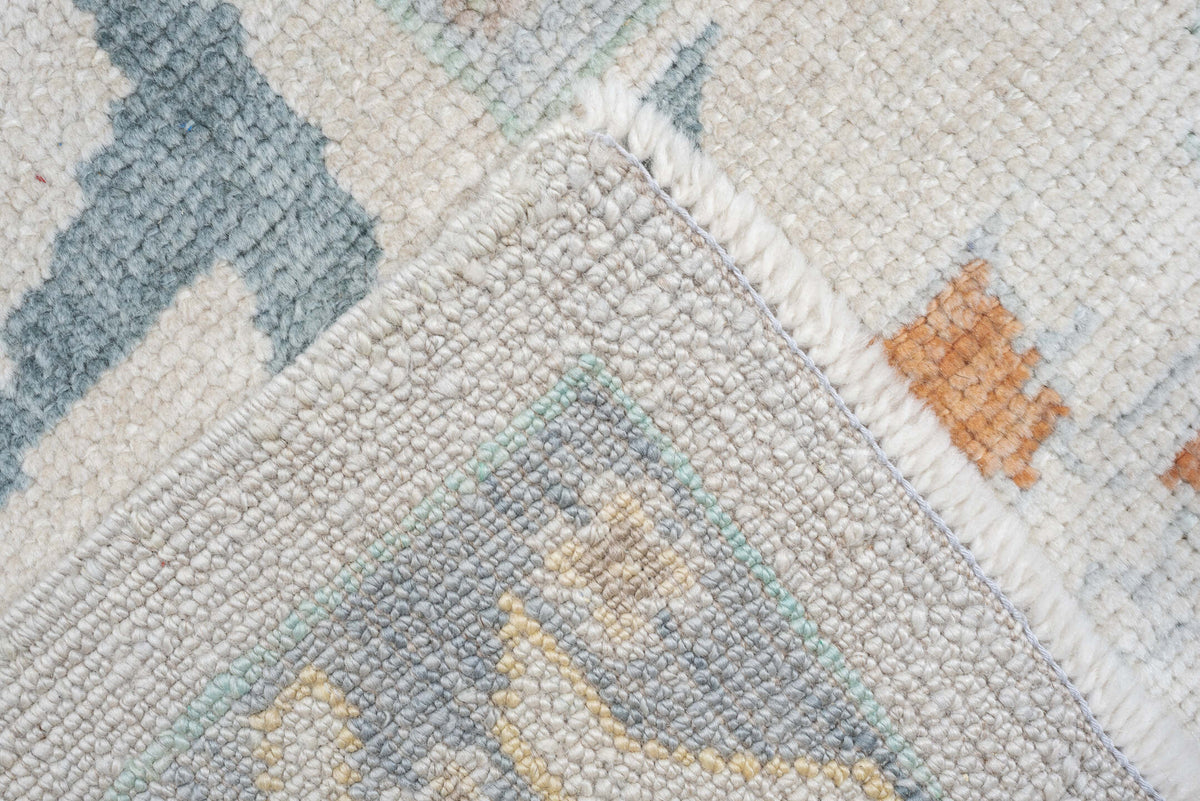 10' x 13' one-of-a-kind handmade vintage Oushak large size rug. Color palette: ivory, powder blue, sage, coral, peach, taupe