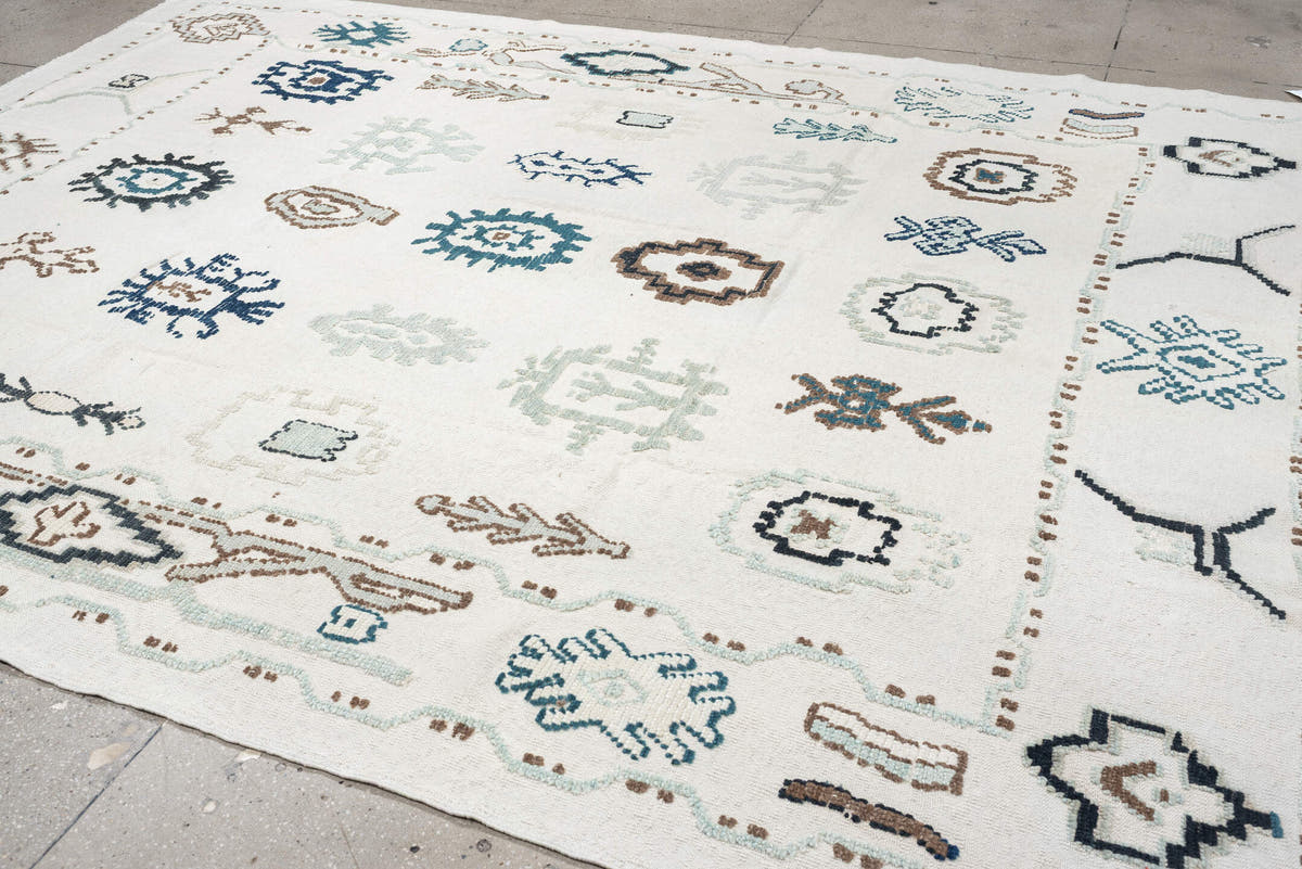 9' x 12' one-of-a-kind handmade vintage Kilim large size rug. Color palette: ivory, pale sage, teal, navy, warm brown