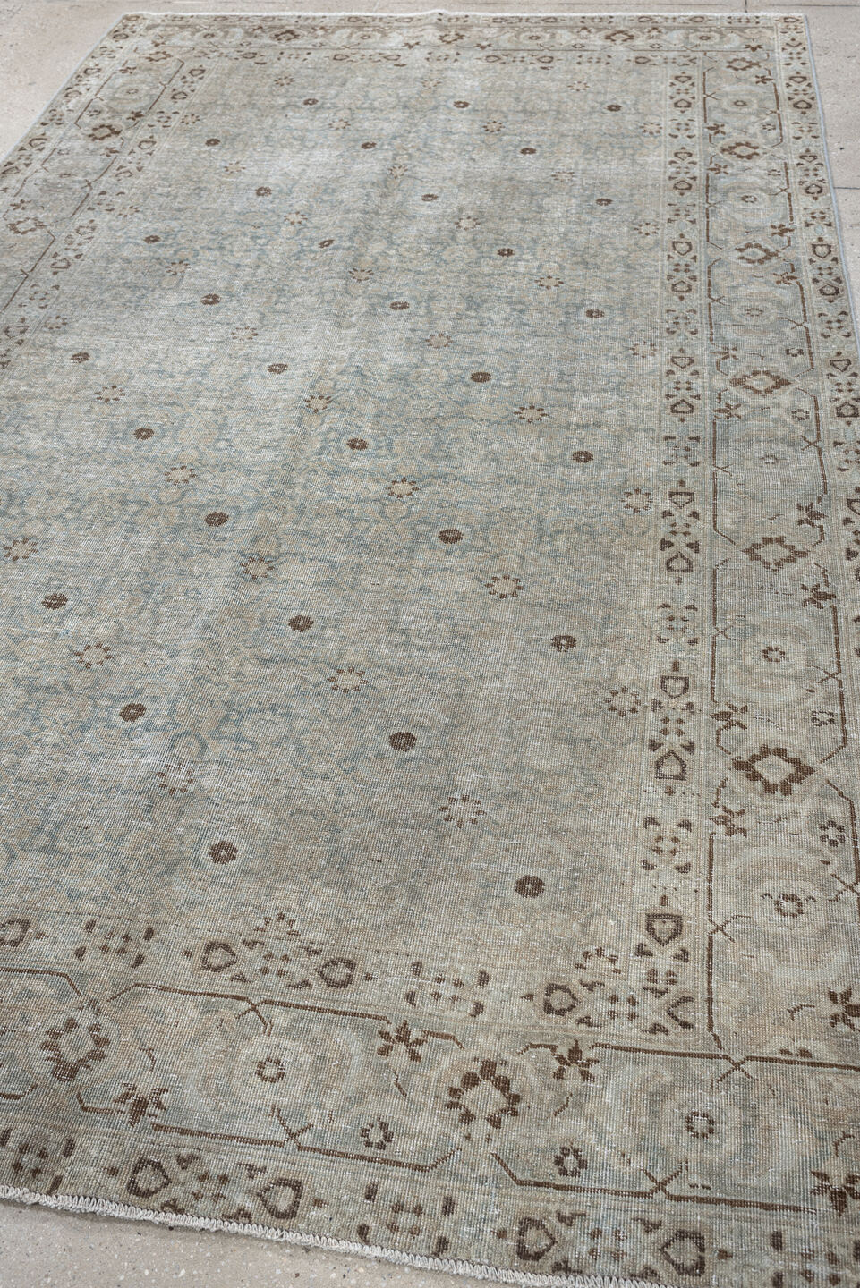 5' x 9' one-of-a-kind handmade antique Tabriz medium size rug. Color palette: blue gray, ivory, taupe, brown, charcoal