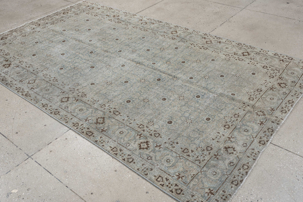 5' x 9' one-of-a-kind handmade antique Tabriz medium size rug. Color palette: blue gray, ivory, taupe, brown, charcoal