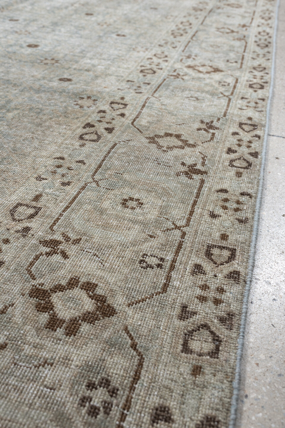 5' x 9' one-of-a-kind handmade antique Tabriz medium size rug. Color palette: blue gray, ivory, taupe, brown, charcoal