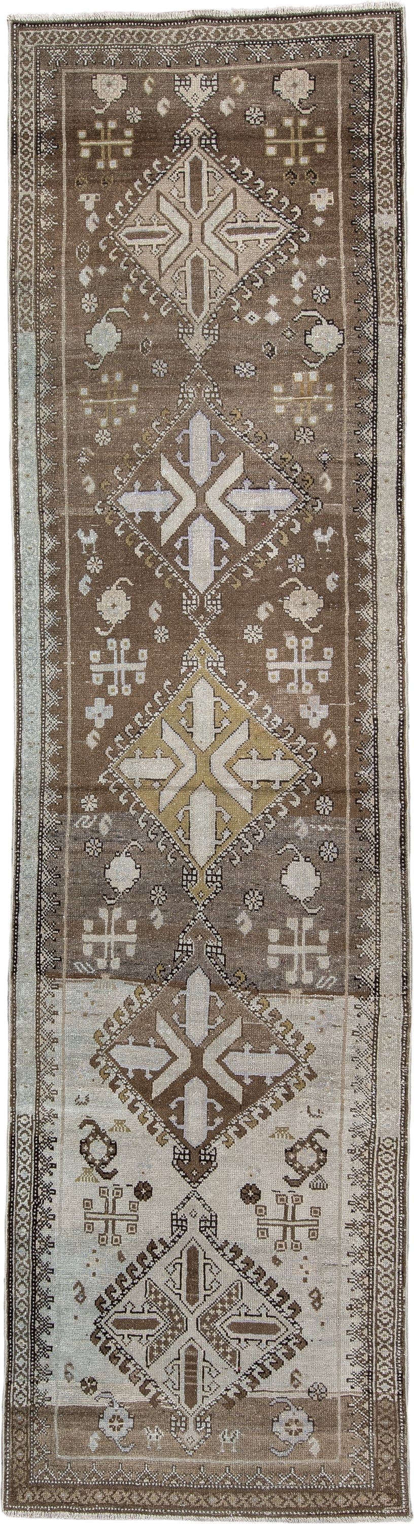 2' x 10' one-of-a-kind handmade antique Kurd runner rug. Color palette: taupe, ivory, camel, charcoal, brown, pale blue