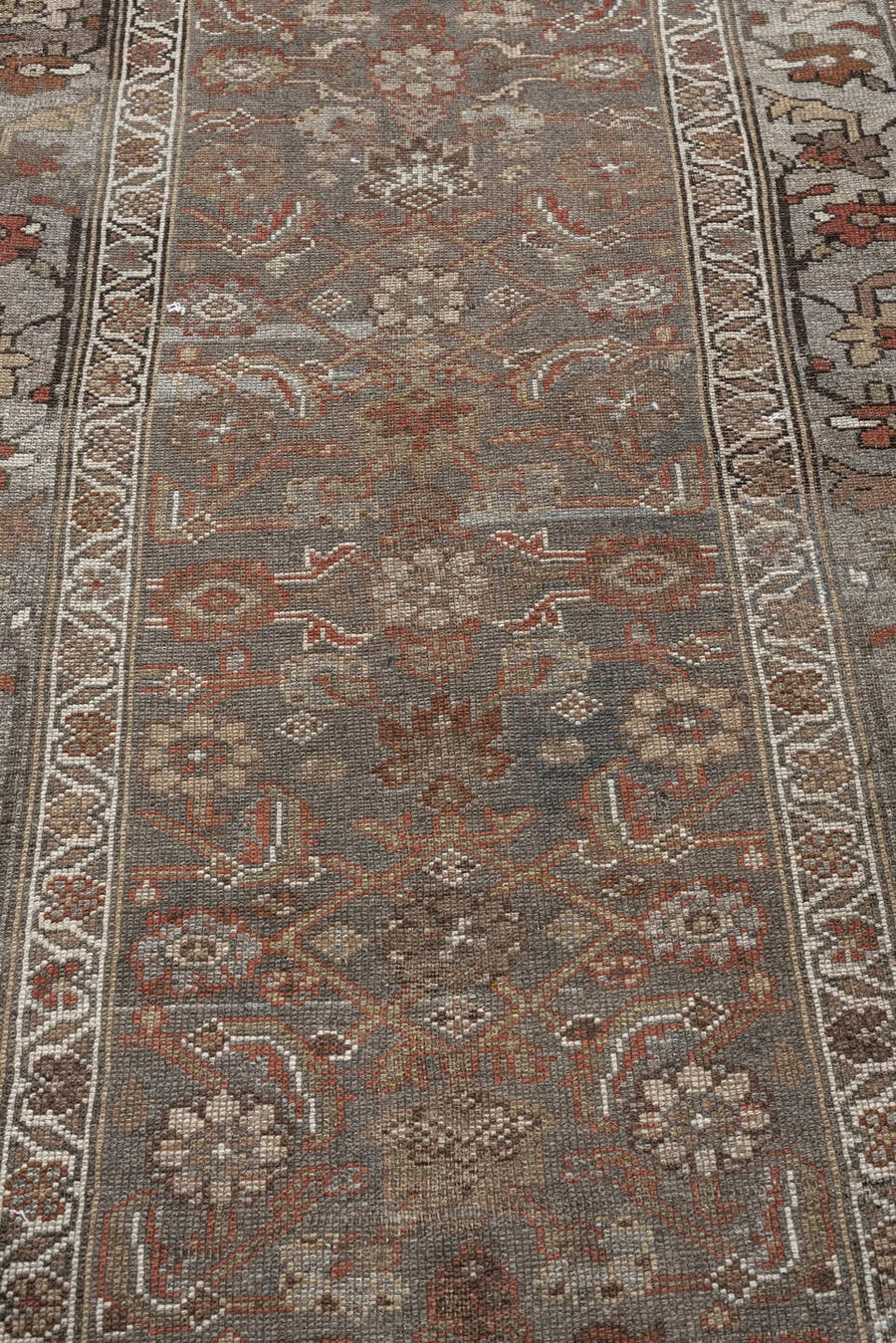 3' x 8' one-of-a-kind handmade antique Bidjar runner rug. Color palette: taupe, ivory, rust, charcoal, brown, sage