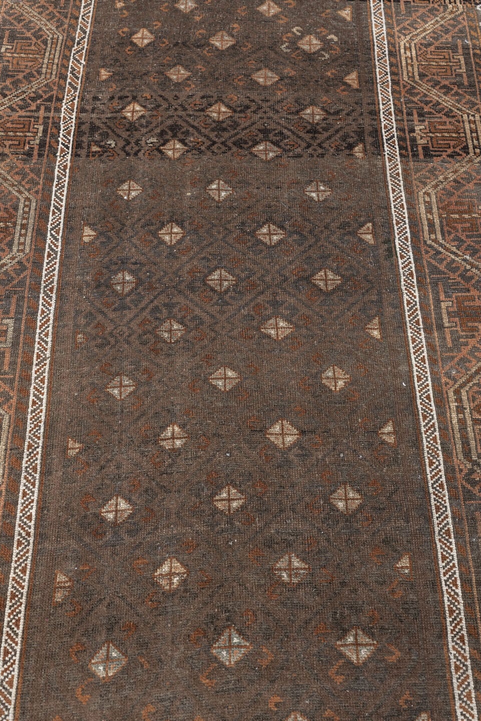 3' x 8' one-of-a-kind handmade antique Belouch runner rug. Color palette: brown, rust, ivory, charcoal, taupe, terracotta