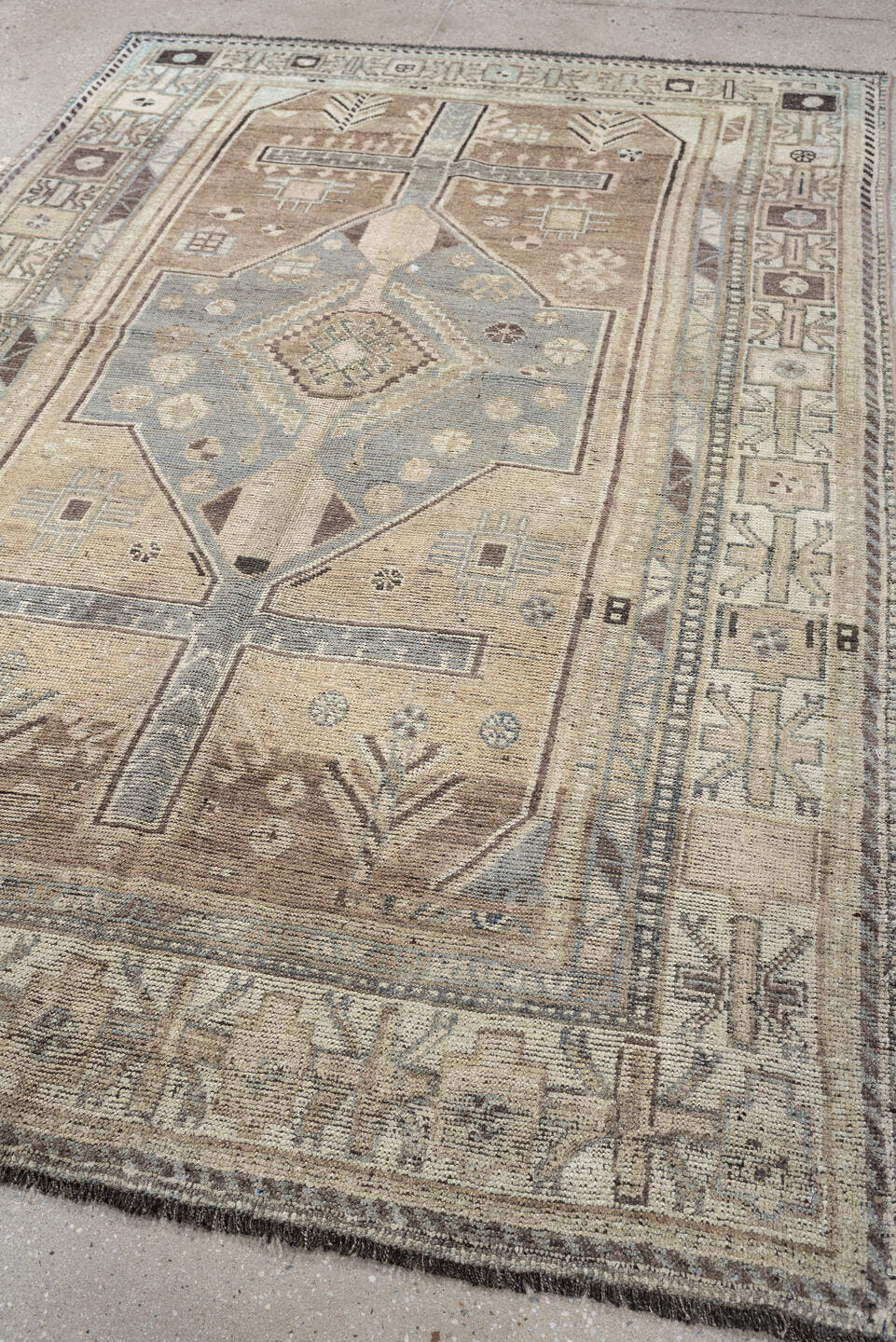 4' x 6' one-of-a-kind handmade antique Shiraz rug. Color palette: taupe, ivory, blue gray, charcoal, brown, sage, beige