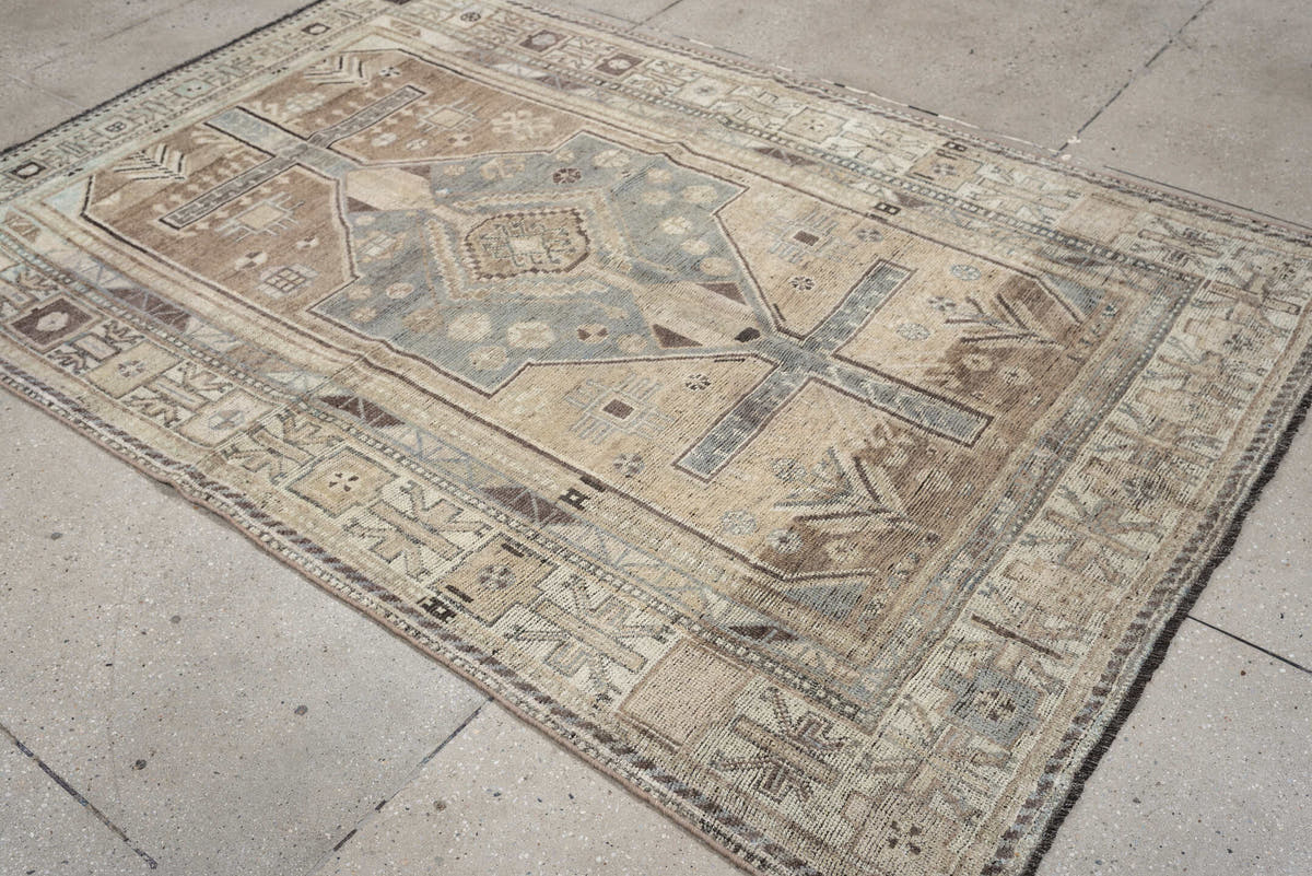 4' x 6' one-of-a-kind handmade antique Shiraz rug. Color palette: taupe, ivory, blue gray, charcoal, brown, sage, beige
