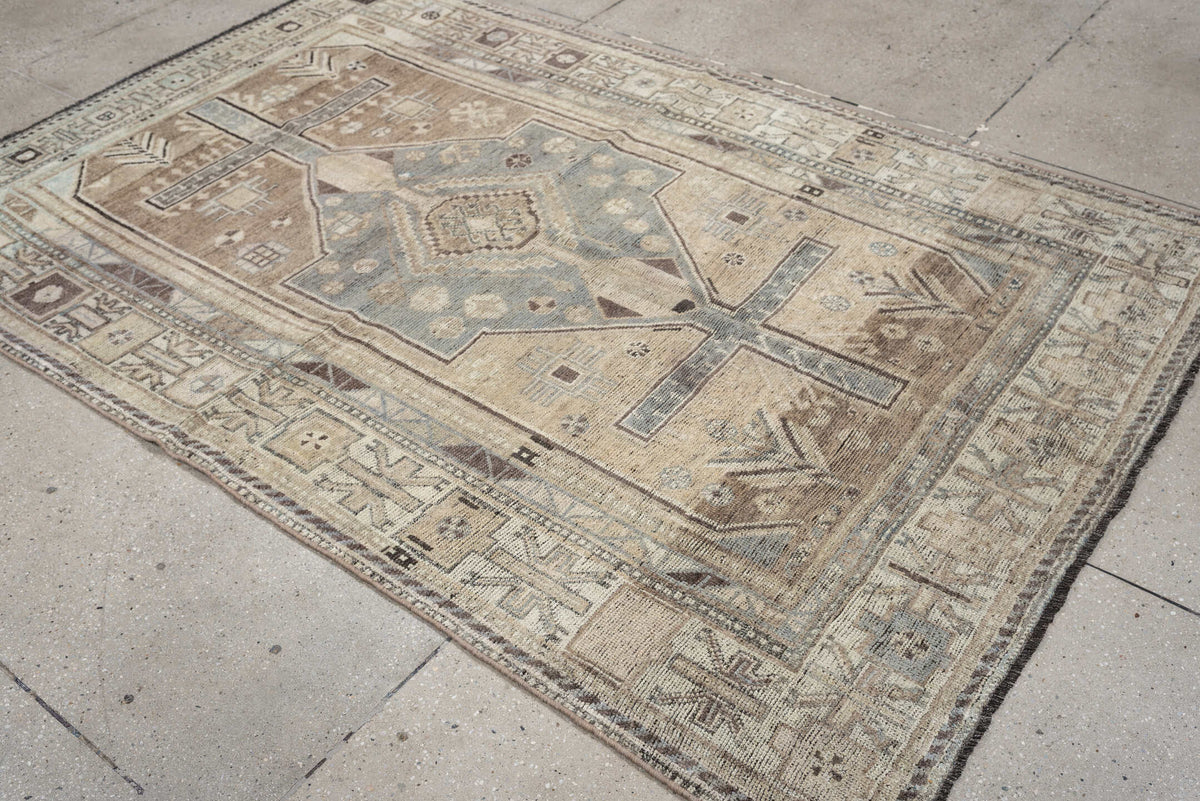 4' x 6' one-of-a-kind handmade antique Shiraz rug. Color palette: taupe, ivory, blue gray, charcoal, brown, sage, beige